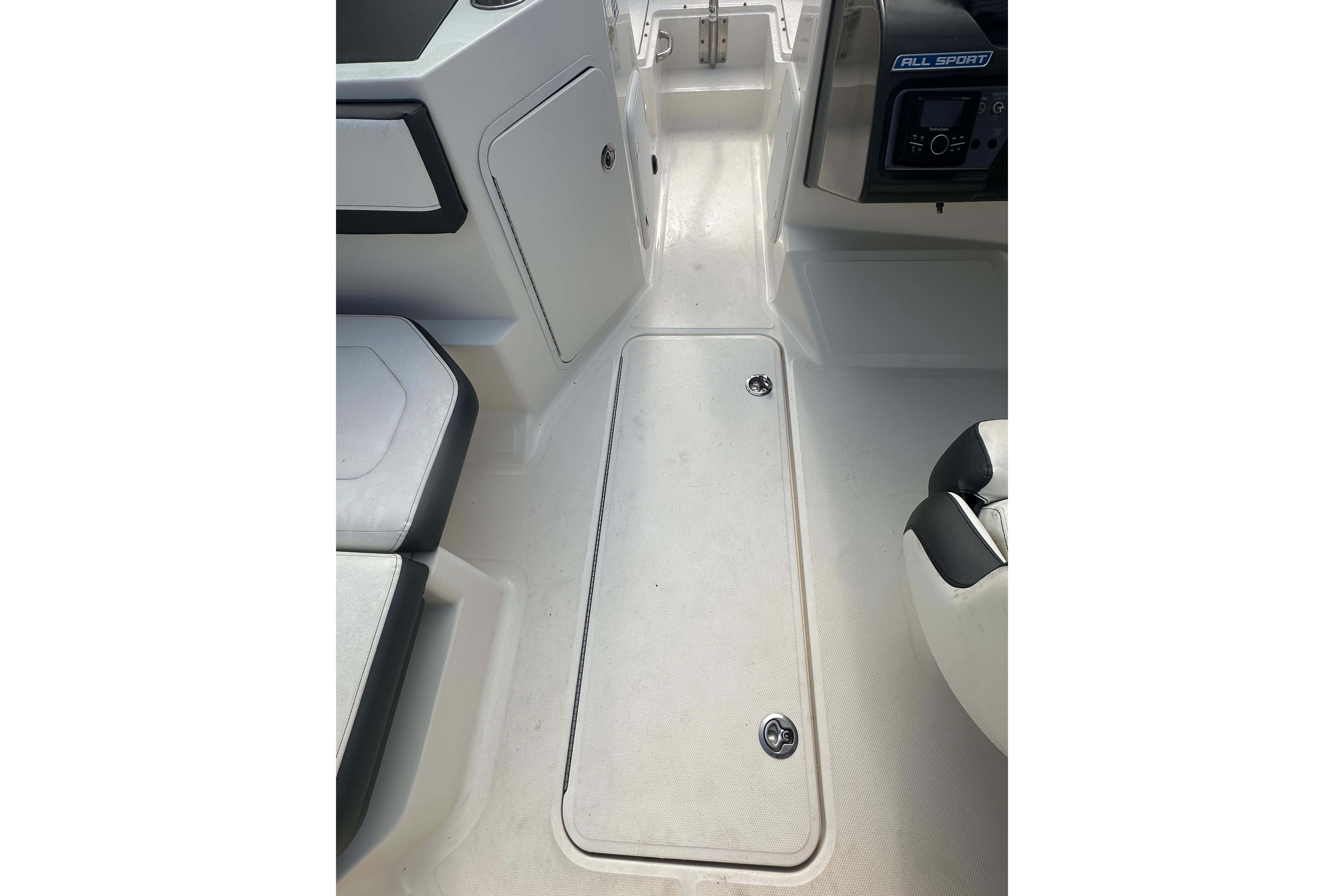 2017 Sea Ray SPX 190 Outboard boat interior, featuring sleek seating and storage compartments.