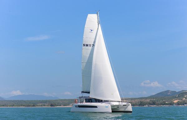 2025 Seawind 1170 catamaran sailing on a clear day.