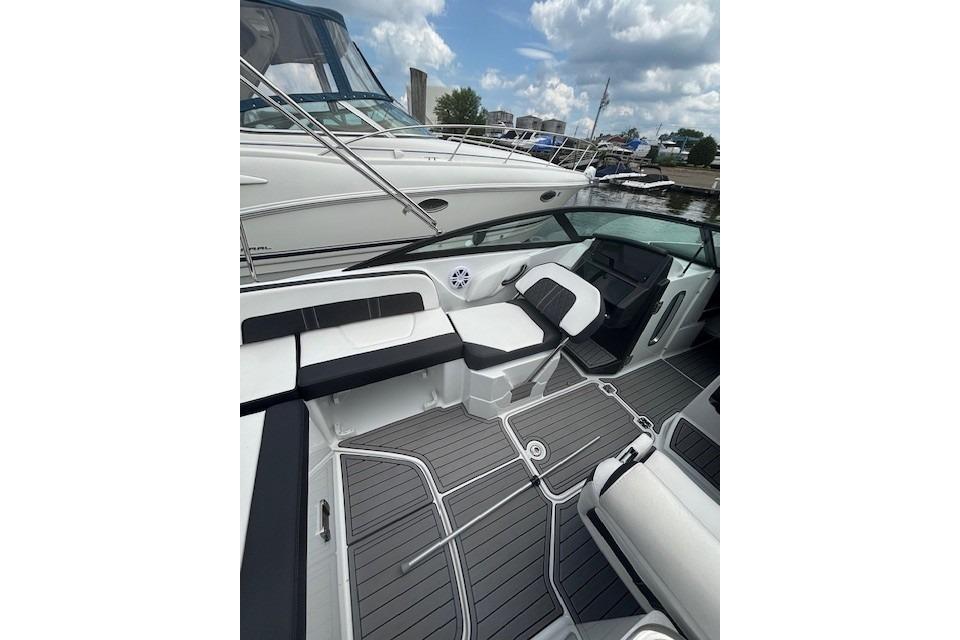 2023 Monterey M-45 boat interior with sleek seating and modern design at a marina.