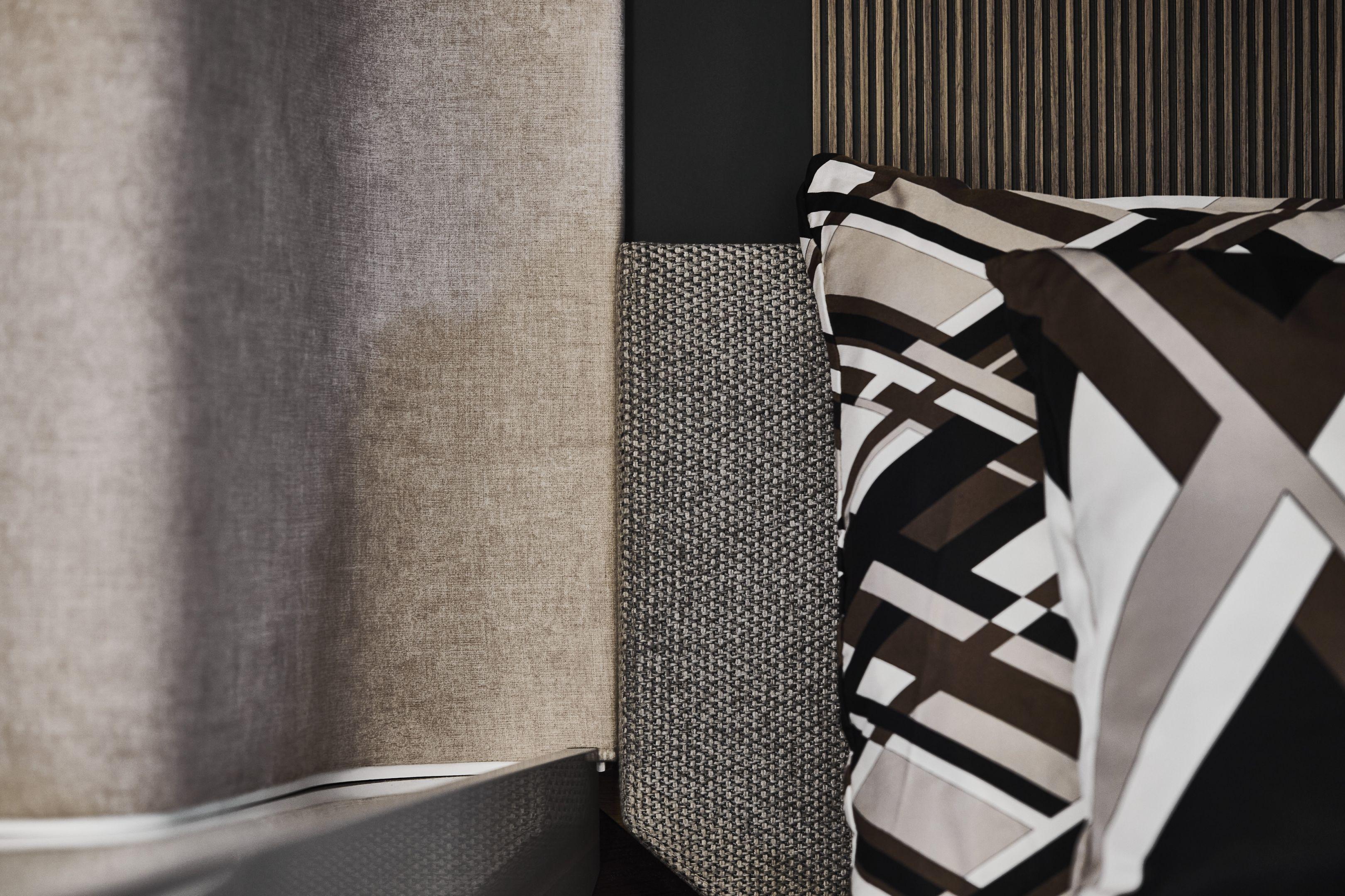 Luxurious interior design with geometric-patterned pillows in the 2026 Prestige X60 model.