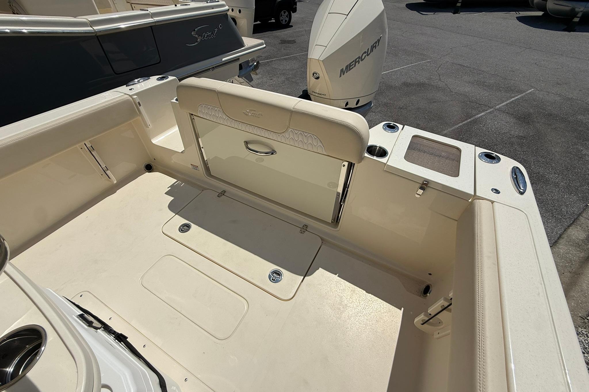 2027 Scout 240 XSF boat interior with Mercury engine, featuring spacious seating and storage.
