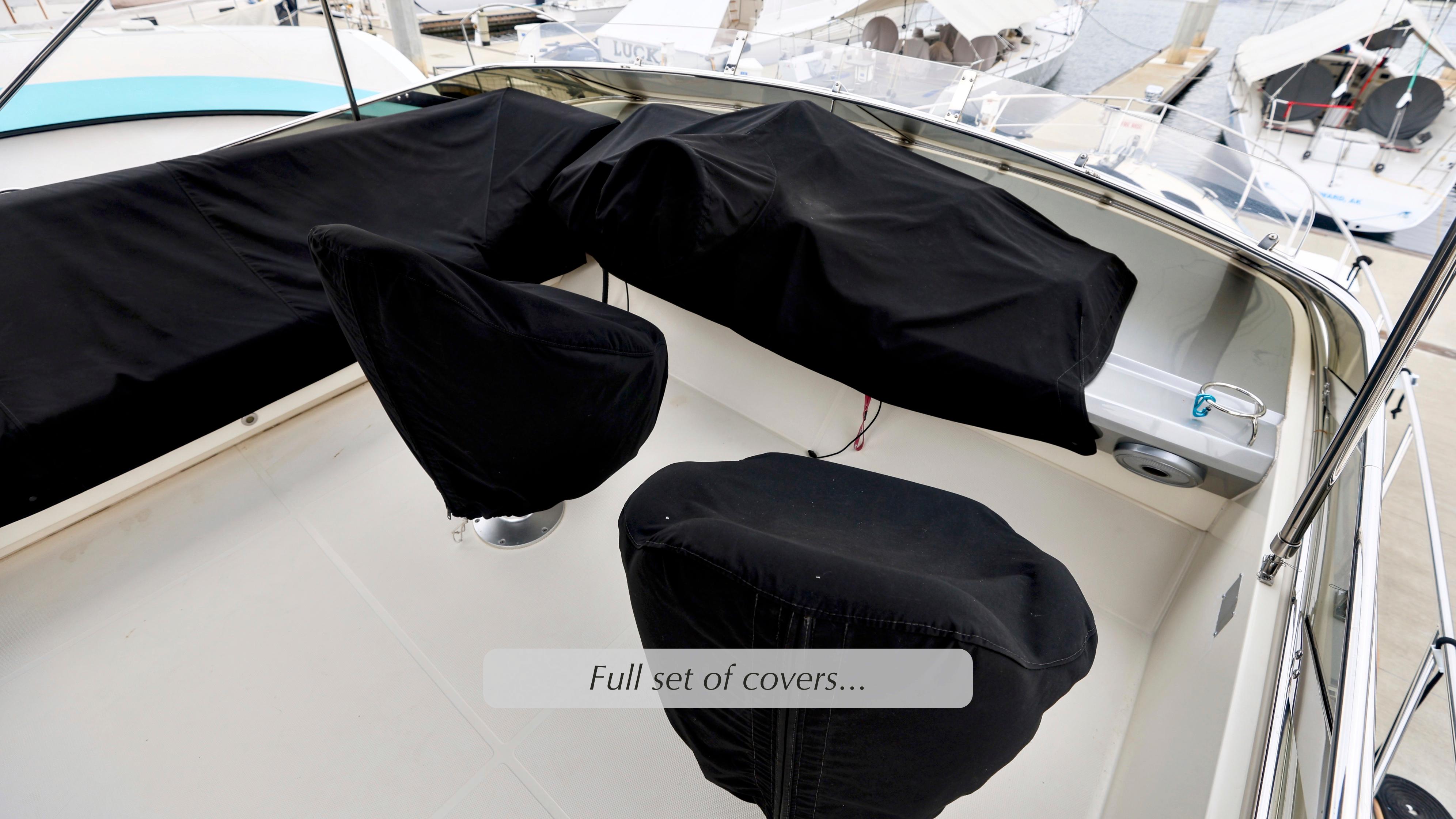 2013 Marquis 500 Sport Bridge with full set of protective covers on deck.