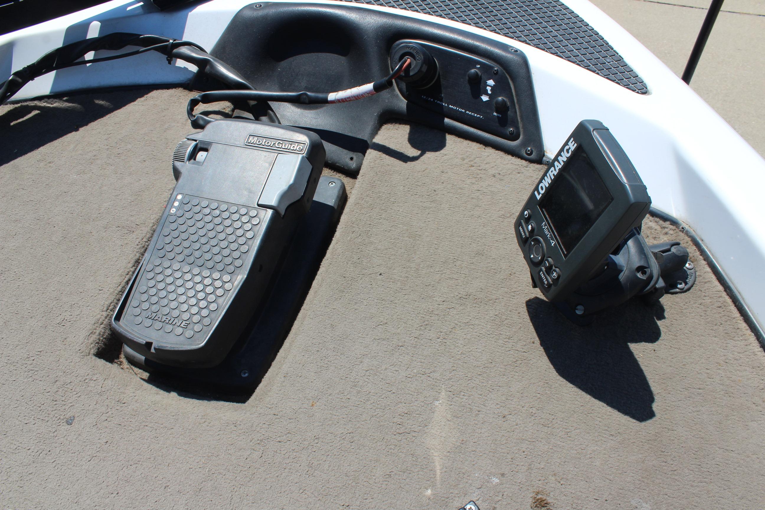 2003 Nitro NX 750 SC boat dashboard with MotorGuide pedal and Lowrance fishfinder.