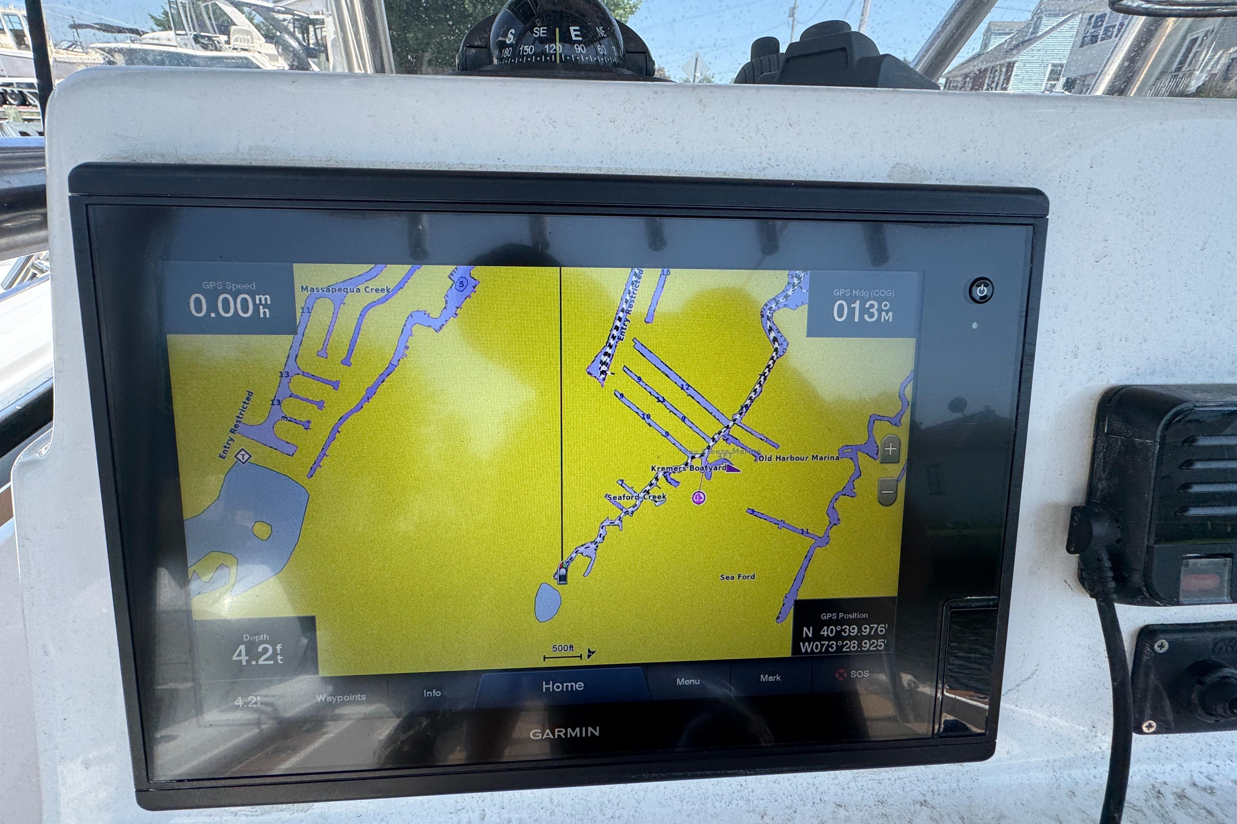 Garmin GPS display on 2014 Century 2301 Center Console boat, showing navigation map.