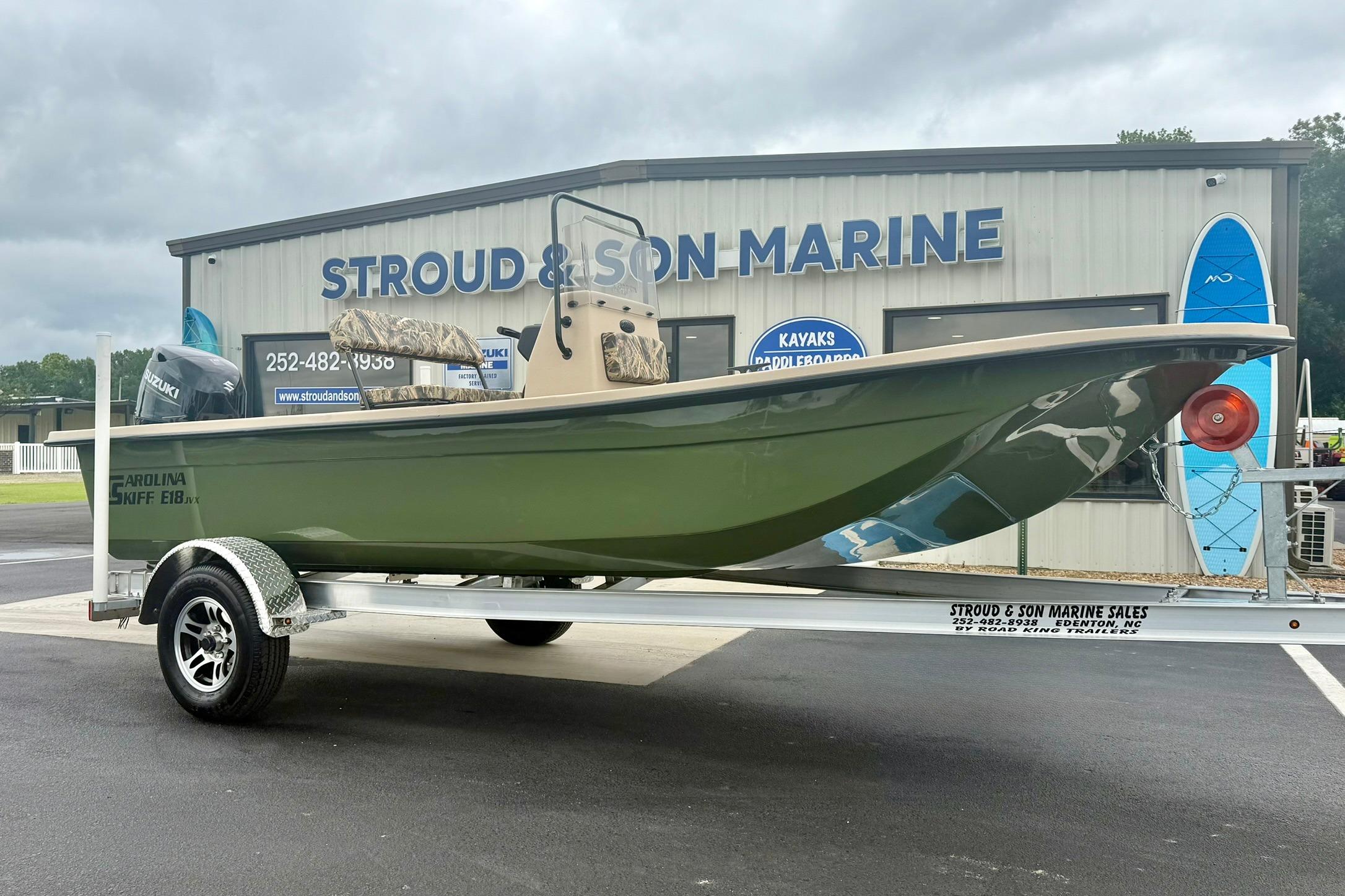 2026 Carolina Skiff E18 JVX CC boat on trailer at Stroud & Son Marine.