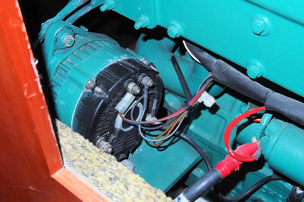 Engine compartment of a 2004 Dufour 40 Performance sailboat, showing wiring and components.