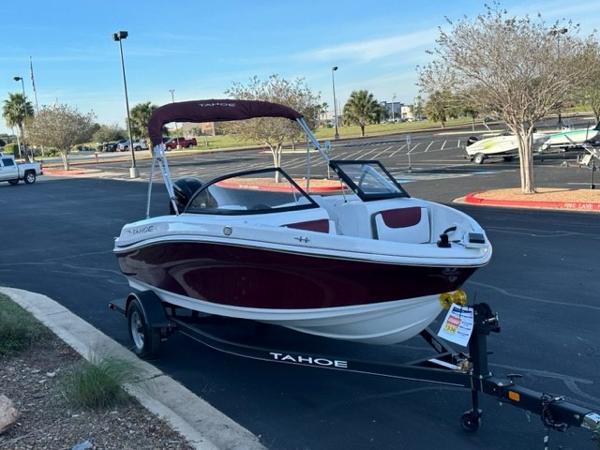 2023 Tahoe 185 S boat with trailer in parking lot.