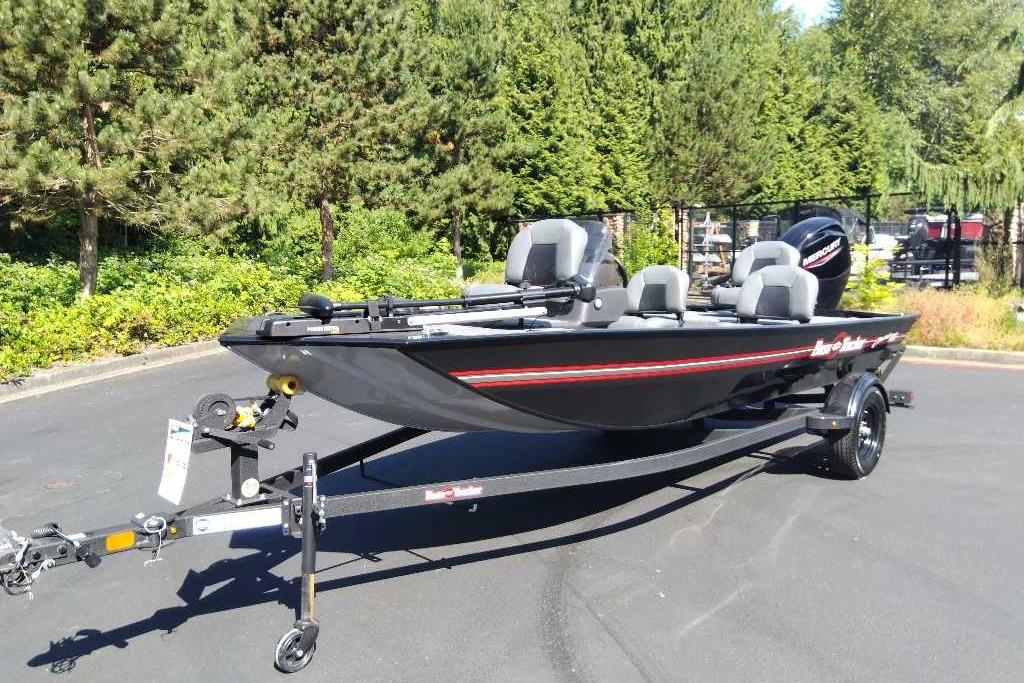 2026 Tracker Bass Tracker Classic XL boat on trailer, parked outdoors.