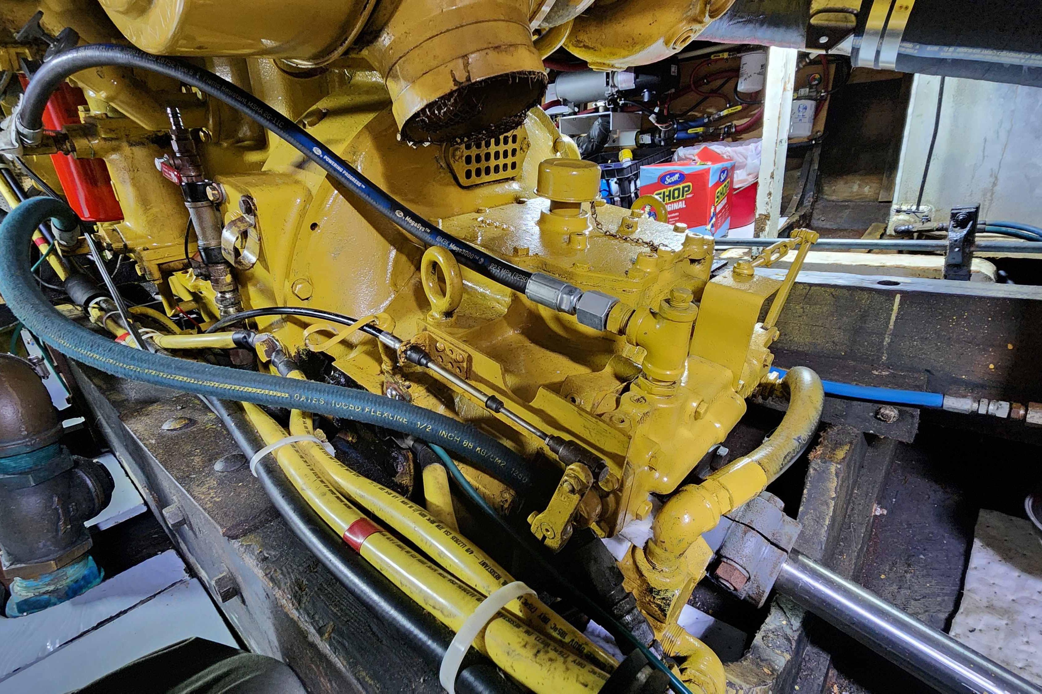Engine compartment of a 1964 Grandy Tour Boat, showcasing detailed mechanical components.
