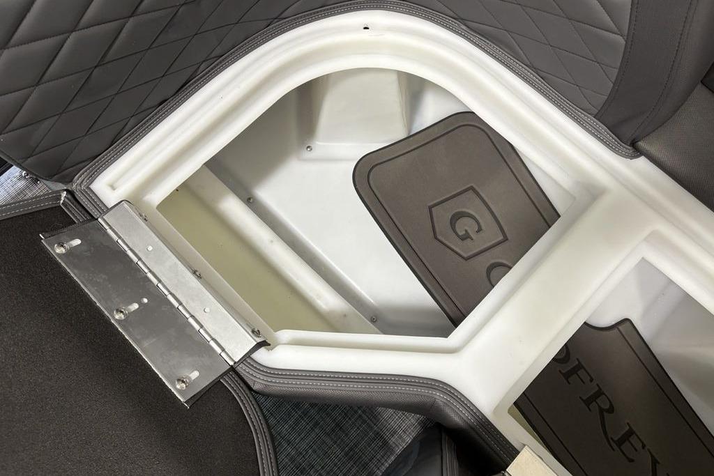 Storage compartment in 2026 Godfrey Monaco 235 SFLC iMPACT 2.0 Package boat.
