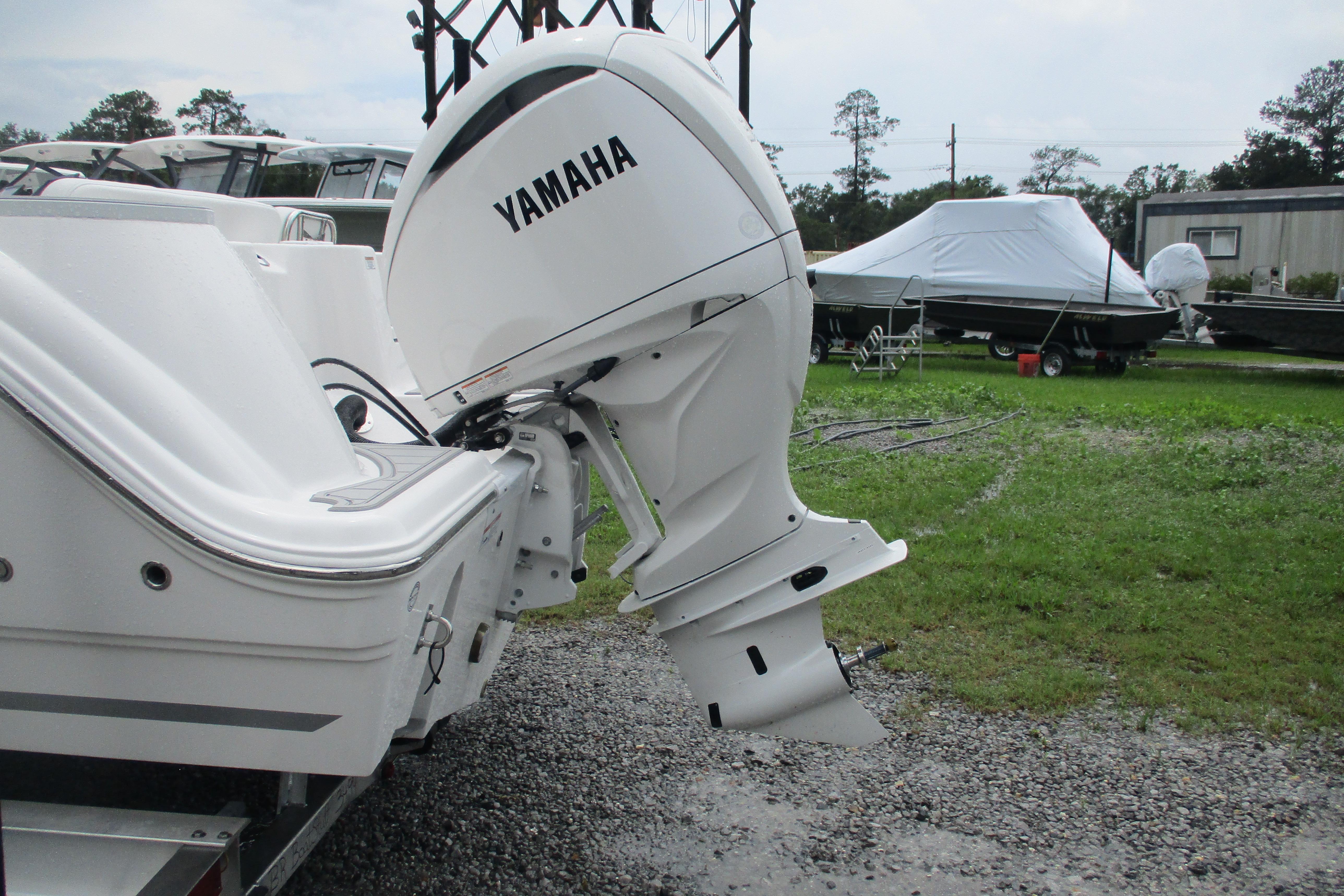 2026 Sea Fox 248 Commander with Yamaha outboard motor in a boatyard setting.