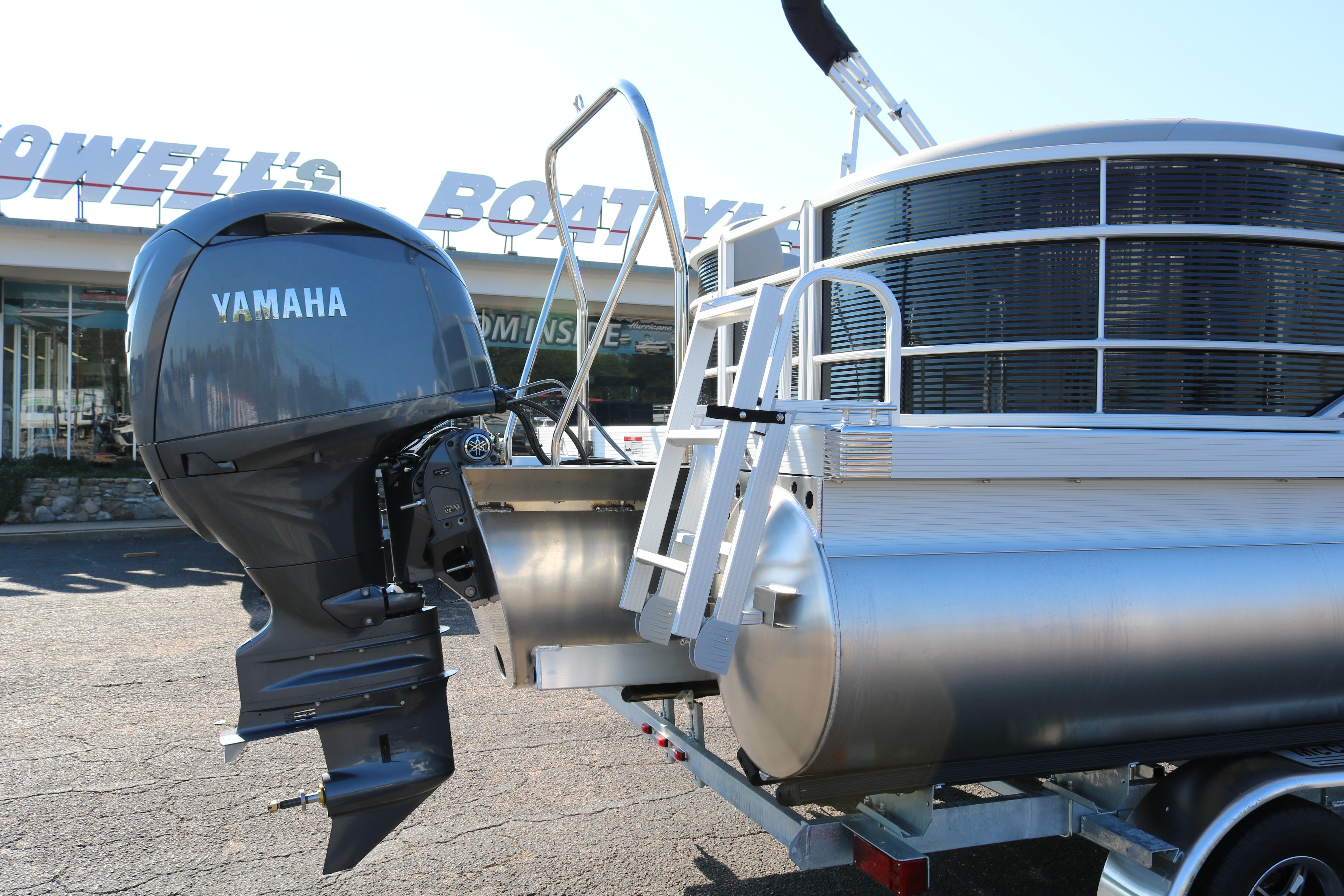2026 Bennington 22SX Stern Radius pontoon boat with Yamaha outboard motor.