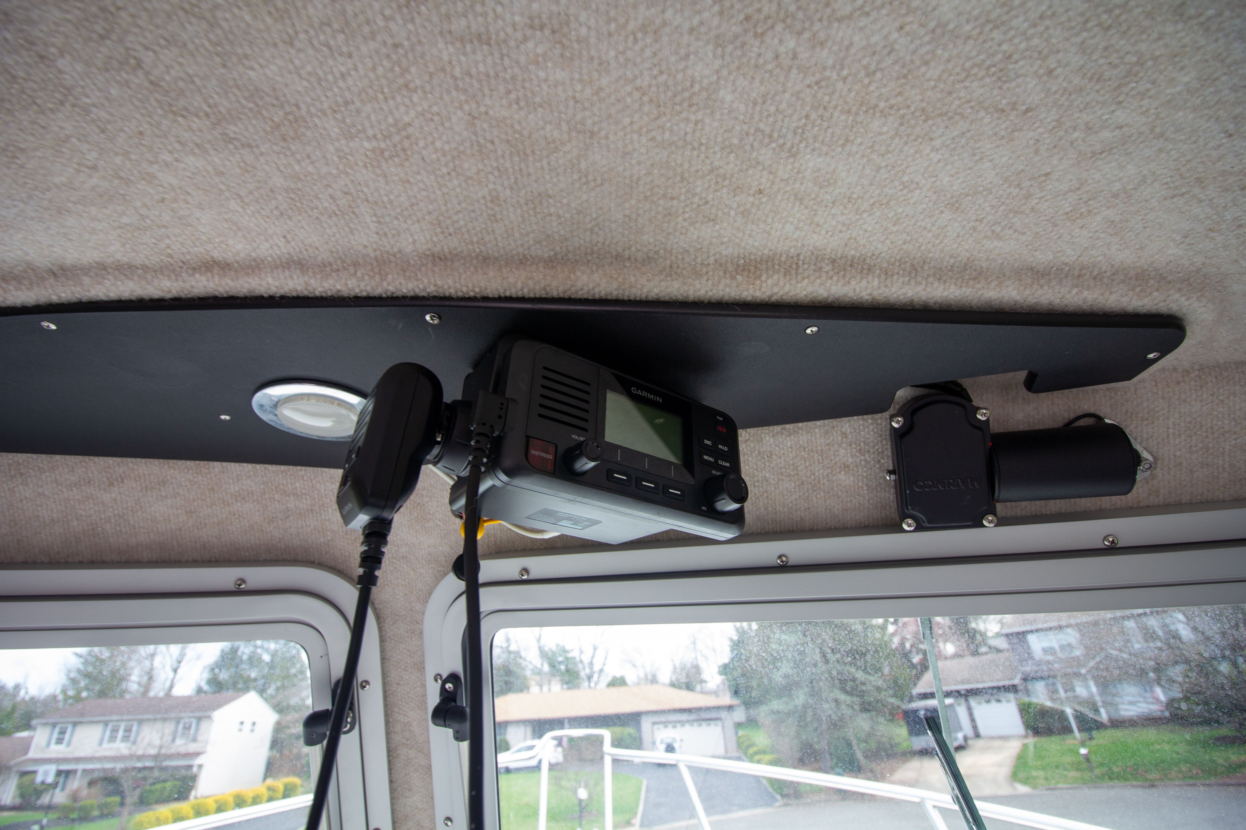 Interior of 2022 Parker 2520 XLD Sport Cabin with radio equipment.