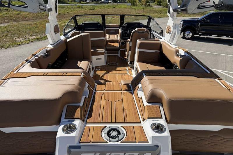 2026 Supra SL boat interior with luxurious seating and wood finish.