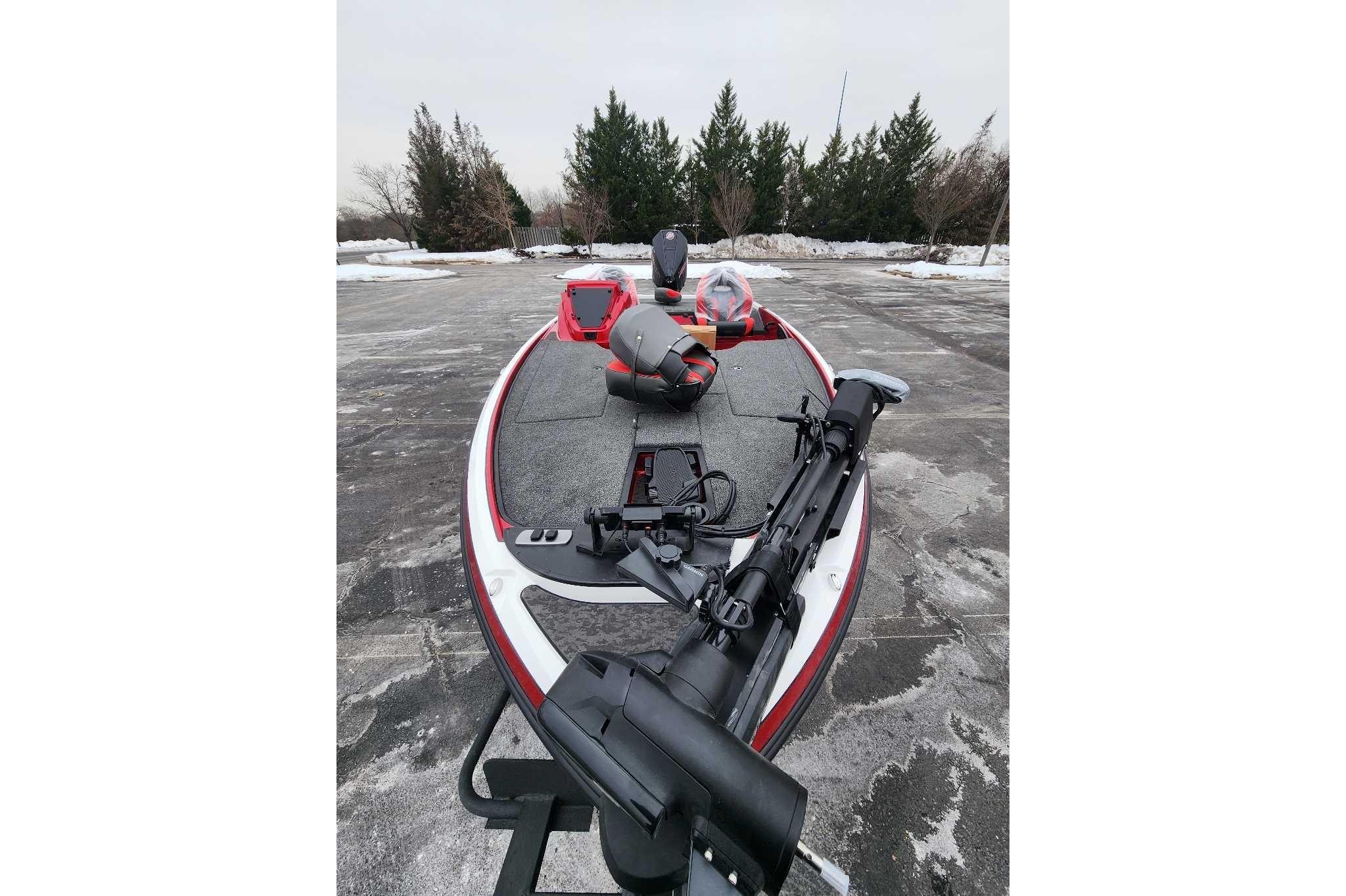 2026 Nitro Z19 XL Pro fishing boat on snowy pavement, featuring advanced equipment.