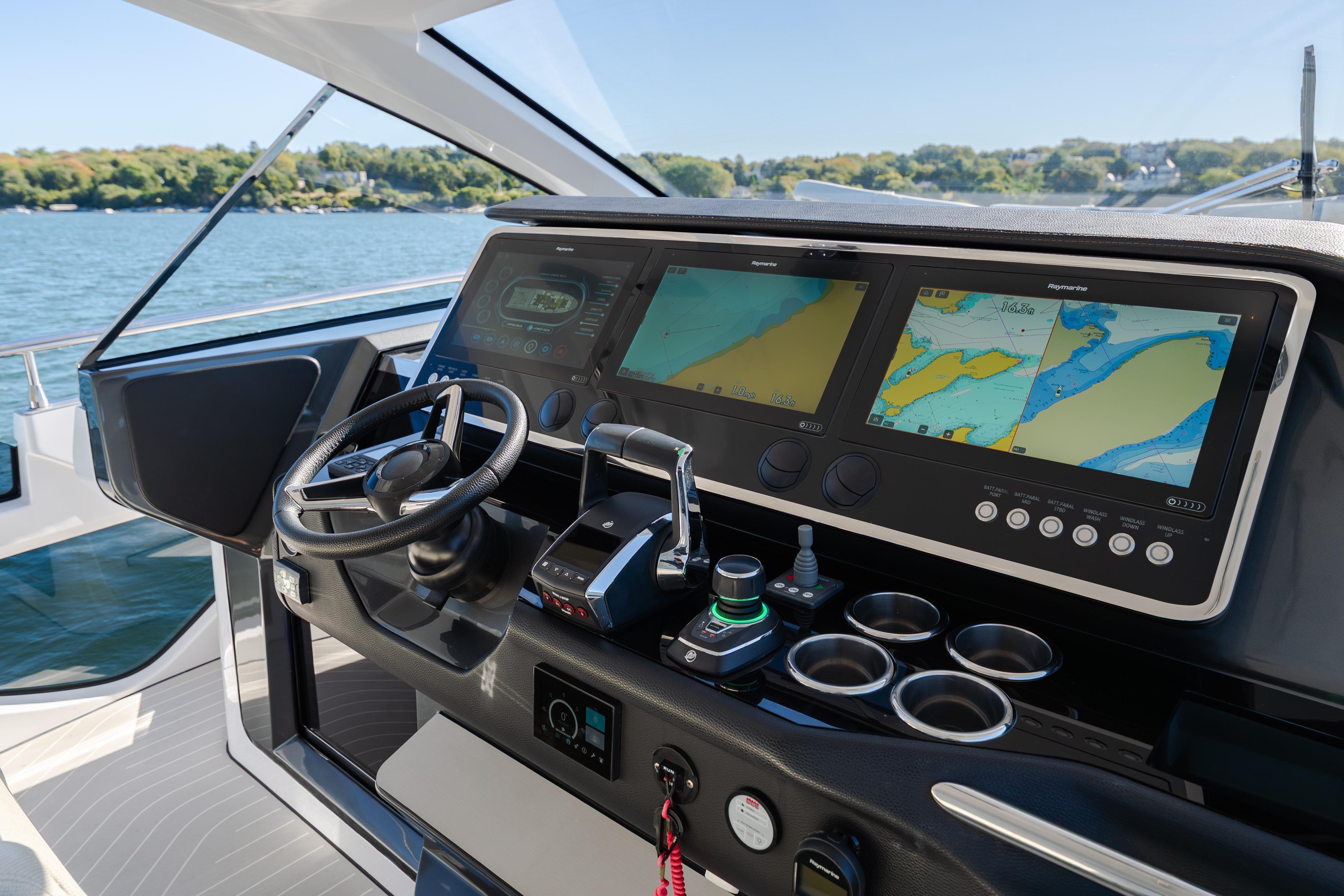 2023 Azimut Verve 47 yacht cockpit with advanced navigation displays and controls.
