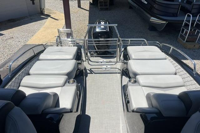 2024 Manitou 25 LX SRW pontoon boat interior with spacious seating and modern design.