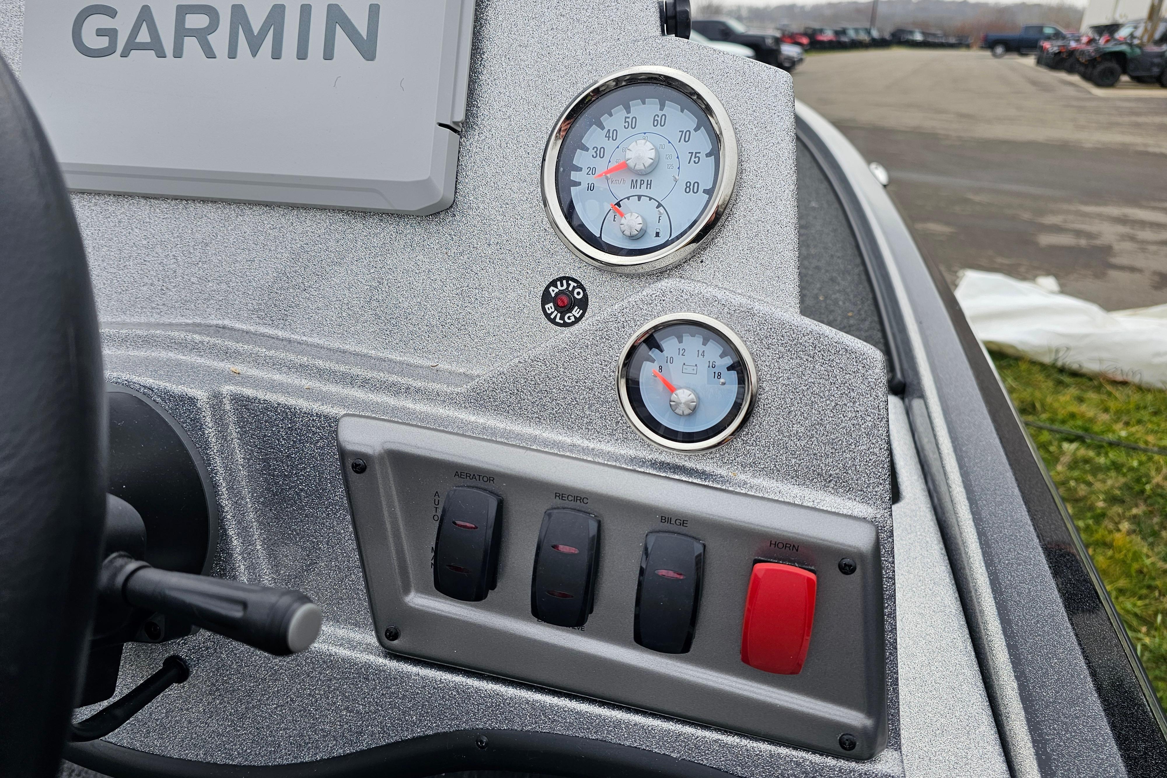 Dashboard of a 2025 Nitro Z18 Pro boat with Garmin display and gauges.