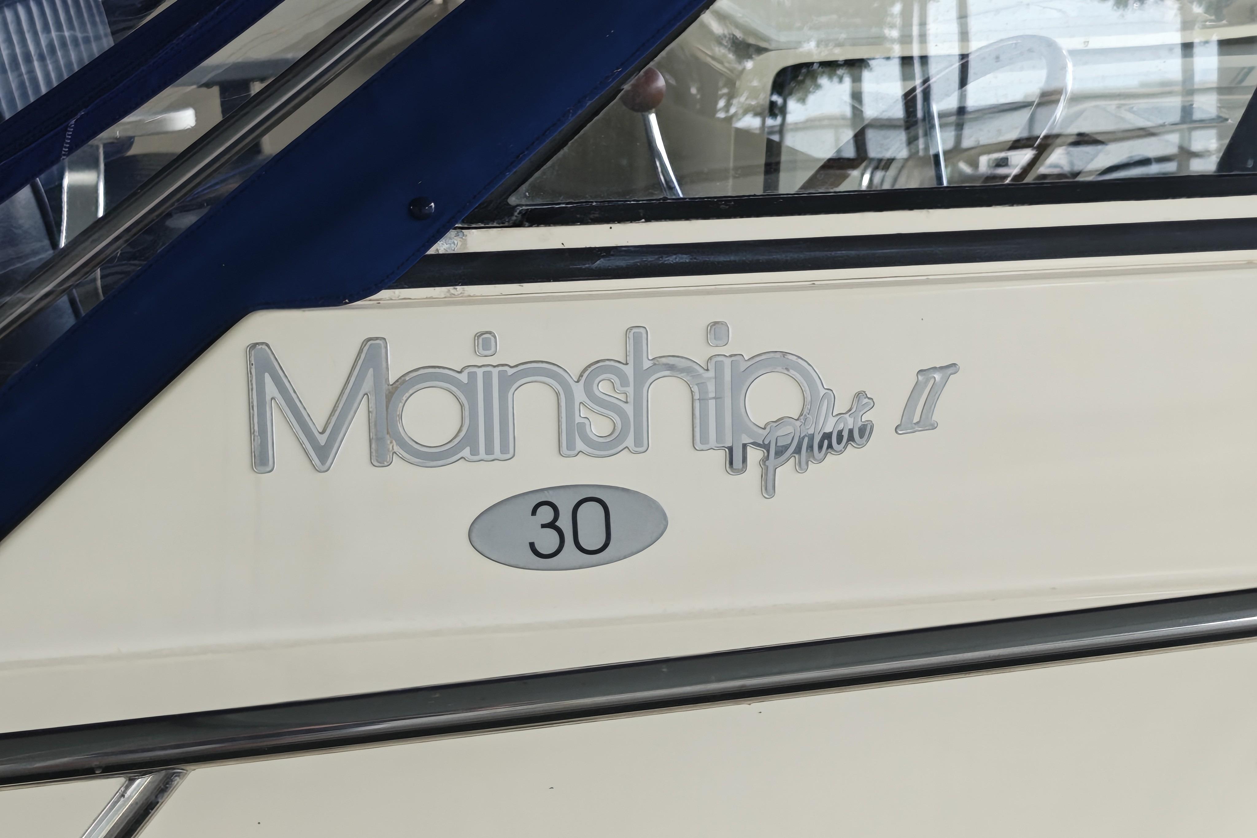 2003 Mainship Pilot 30-II boat logo on side panel.