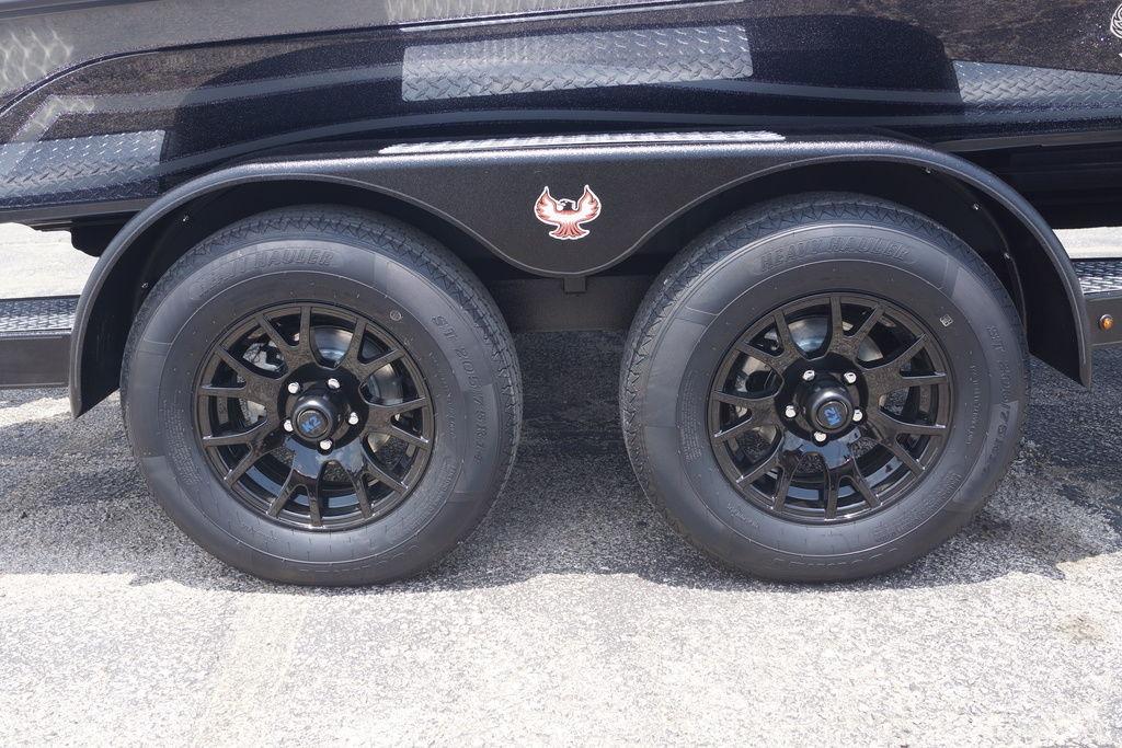 2027 Phoenix 921 Elite X II trailer with dual black alloy wheels and emblem.