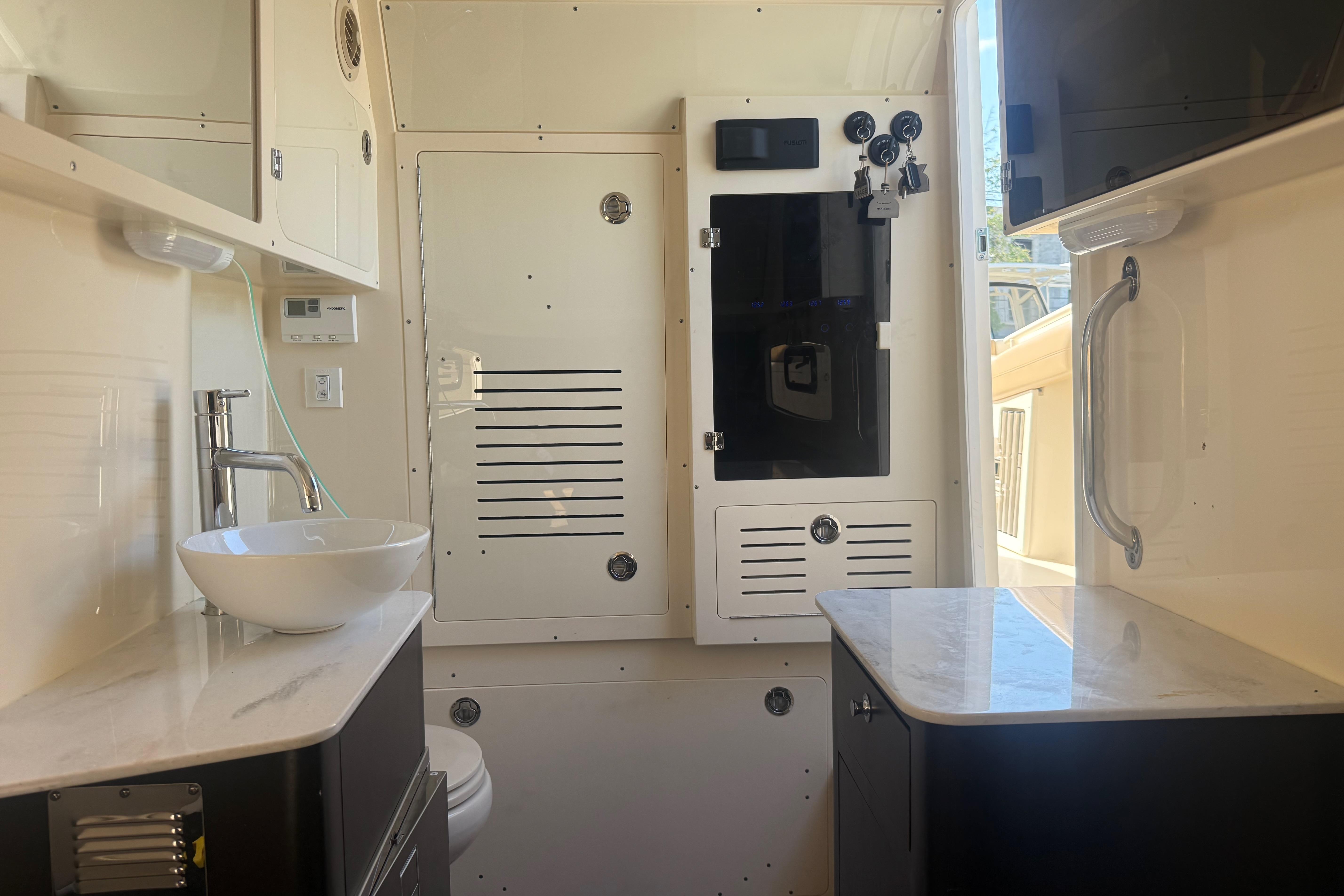 Luxurious interior of 2022 Scout 355 LXF boat featuring modern amenities and sleek design.