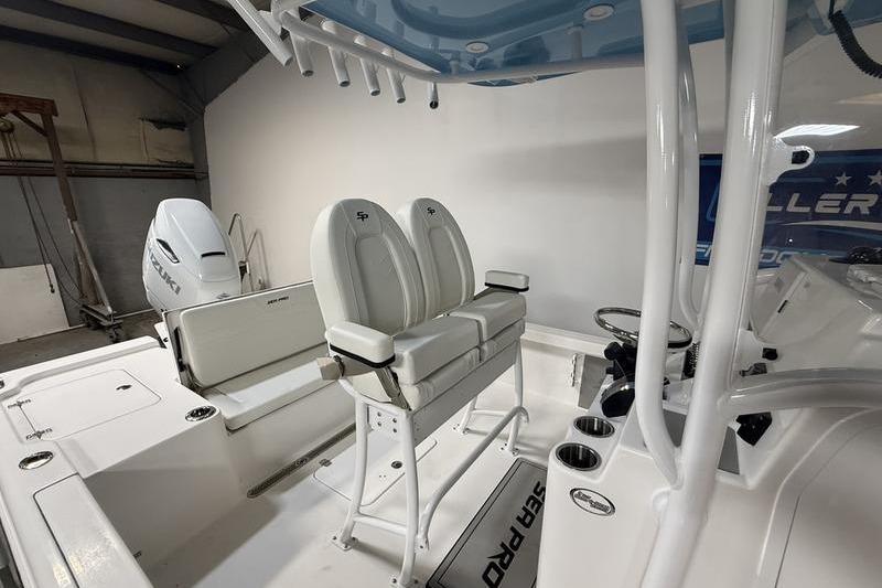 2026 Sea Pro 250 Bay boat interior with dual seats and modern console design.