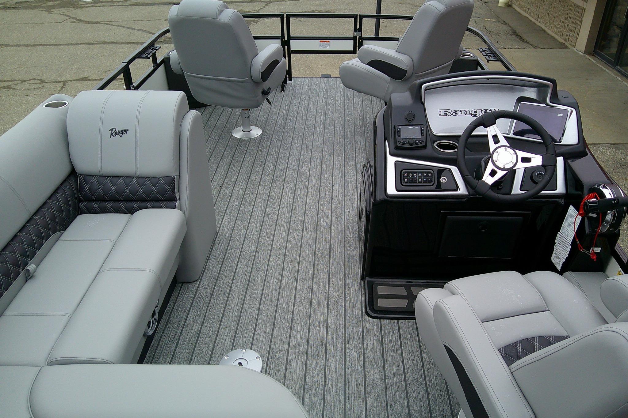 2026 Ranger 220F boat interior with modern seating and steering console.