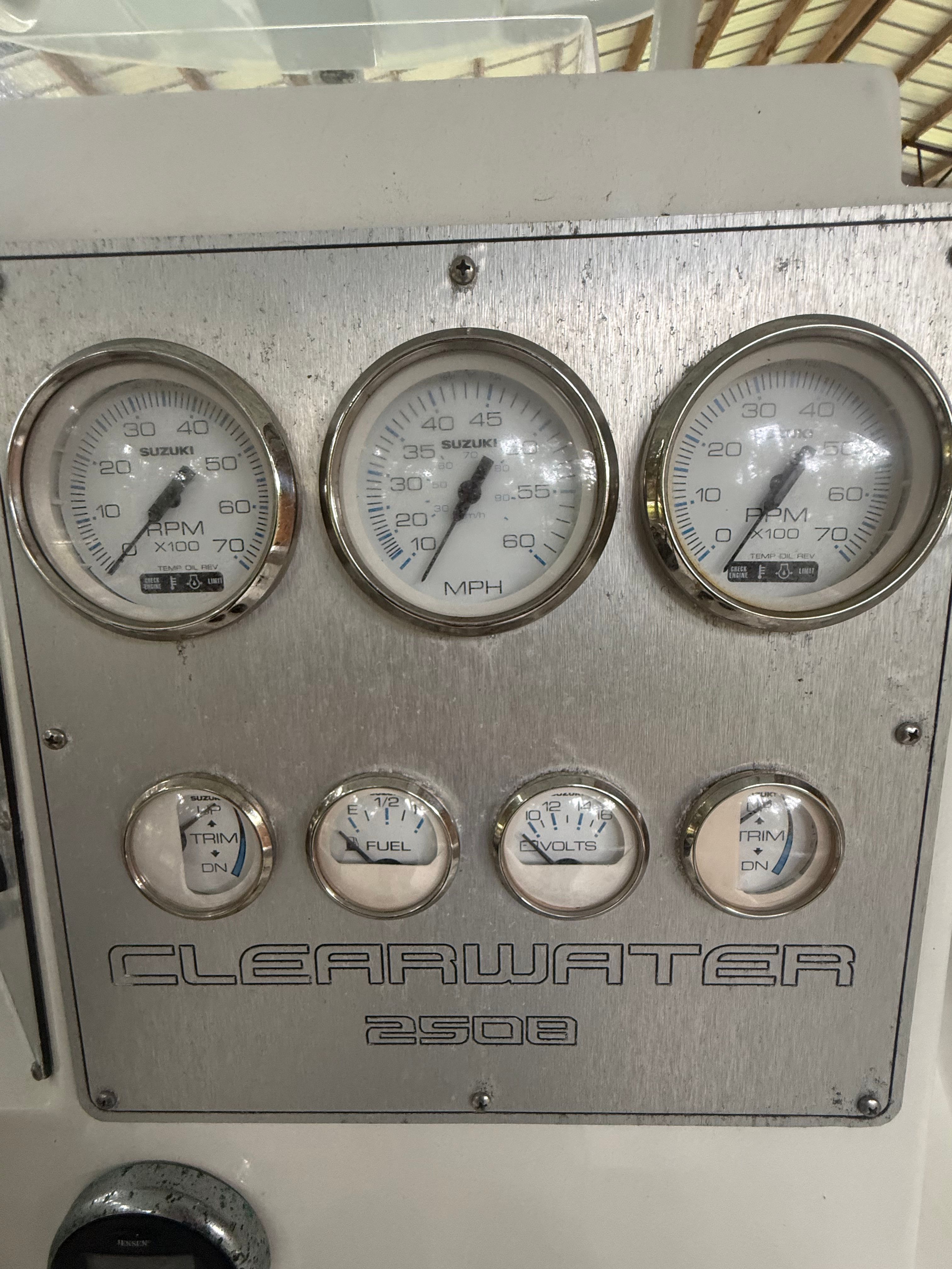 Dashboard with gauges and dials on a Clearwater 2508 Center Console boat.