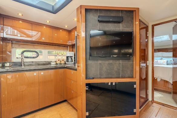 Luxurious 2016 Sea Ray Sundancer 510 yacht interior with modern kitchen and entertainment area.