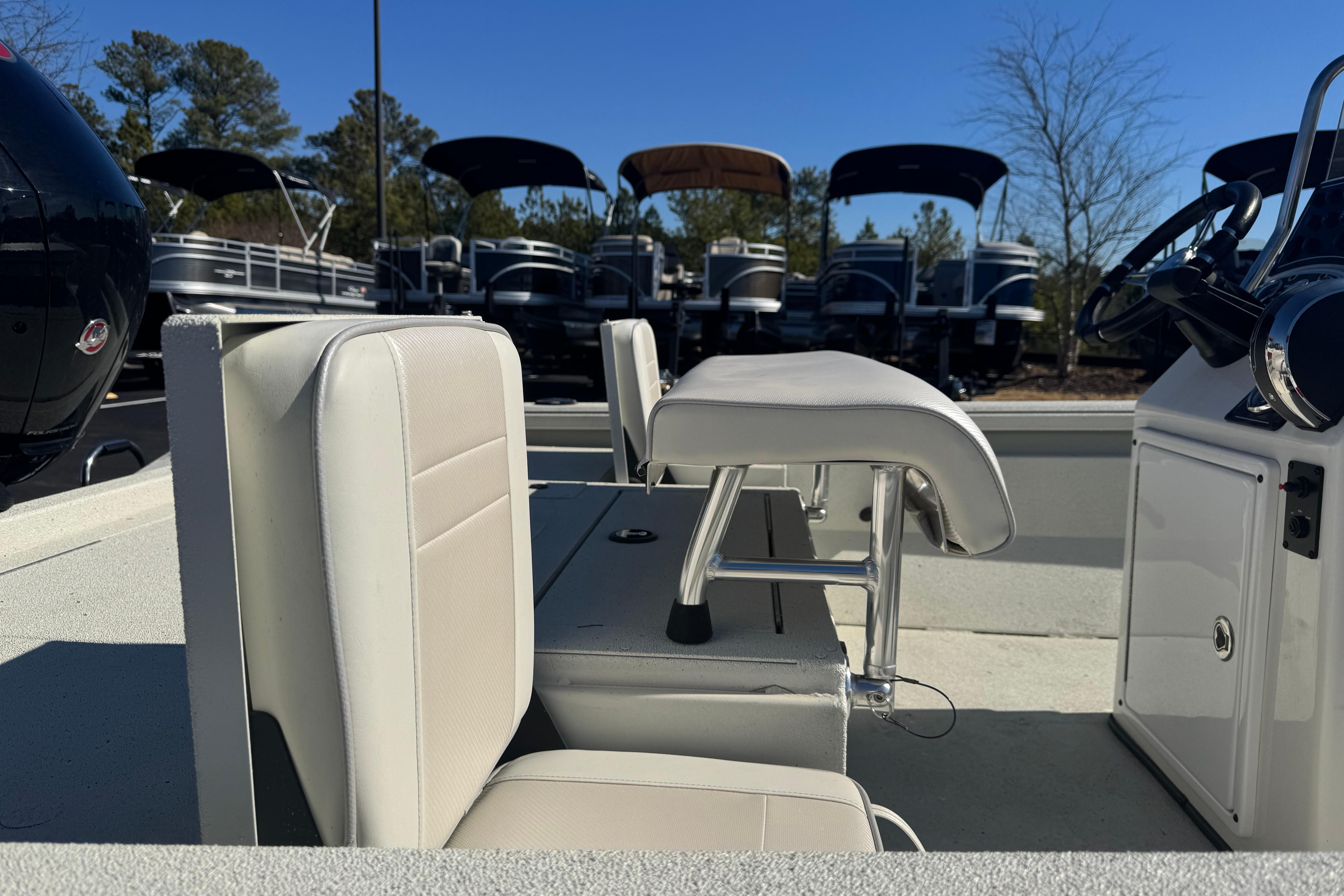 2026 Ranger RB200 boat interior with white seating and steering console.