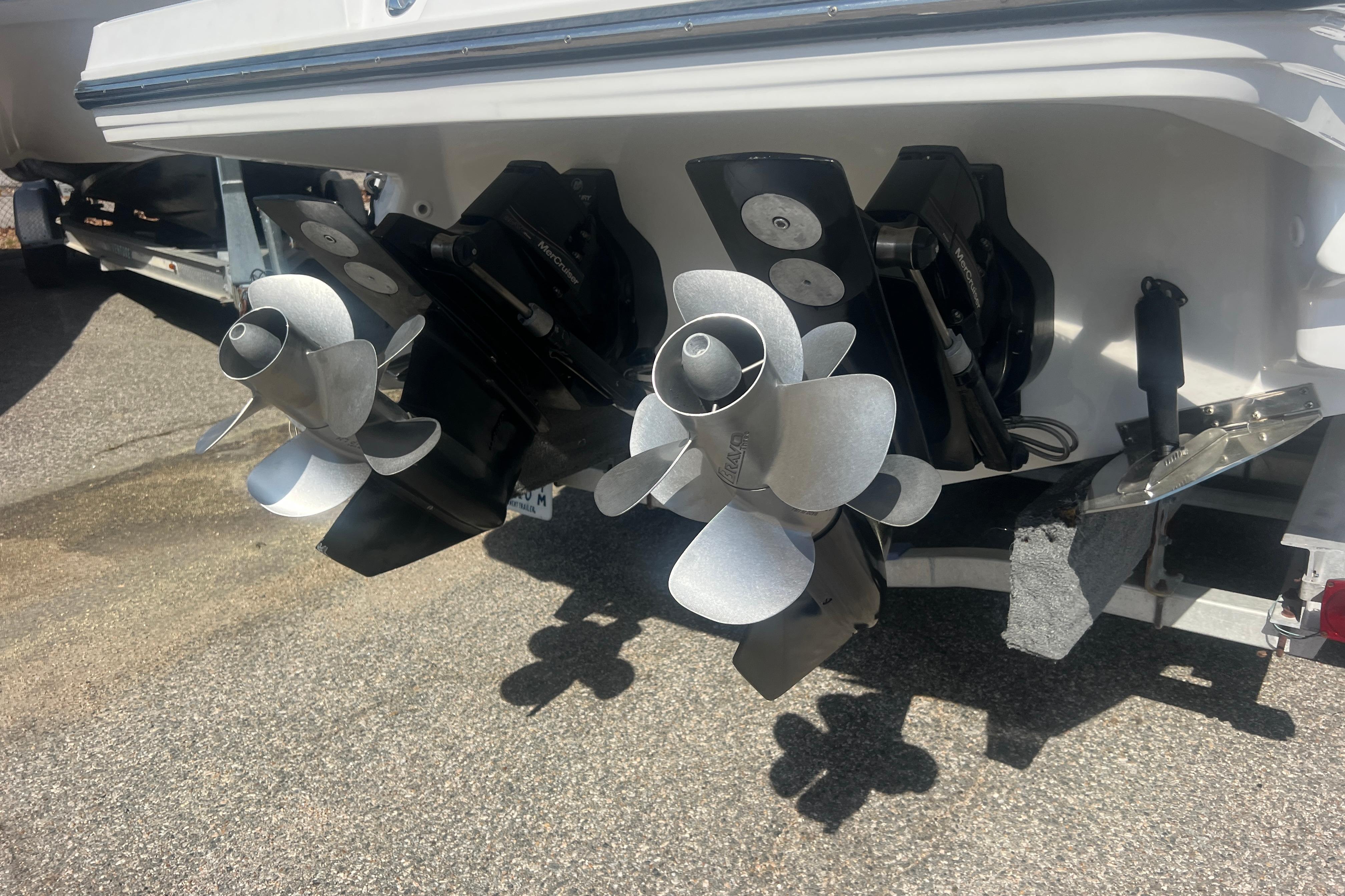 Twin propellers of a 2017 Monterey 298SS Super Sport boat on a trailer.