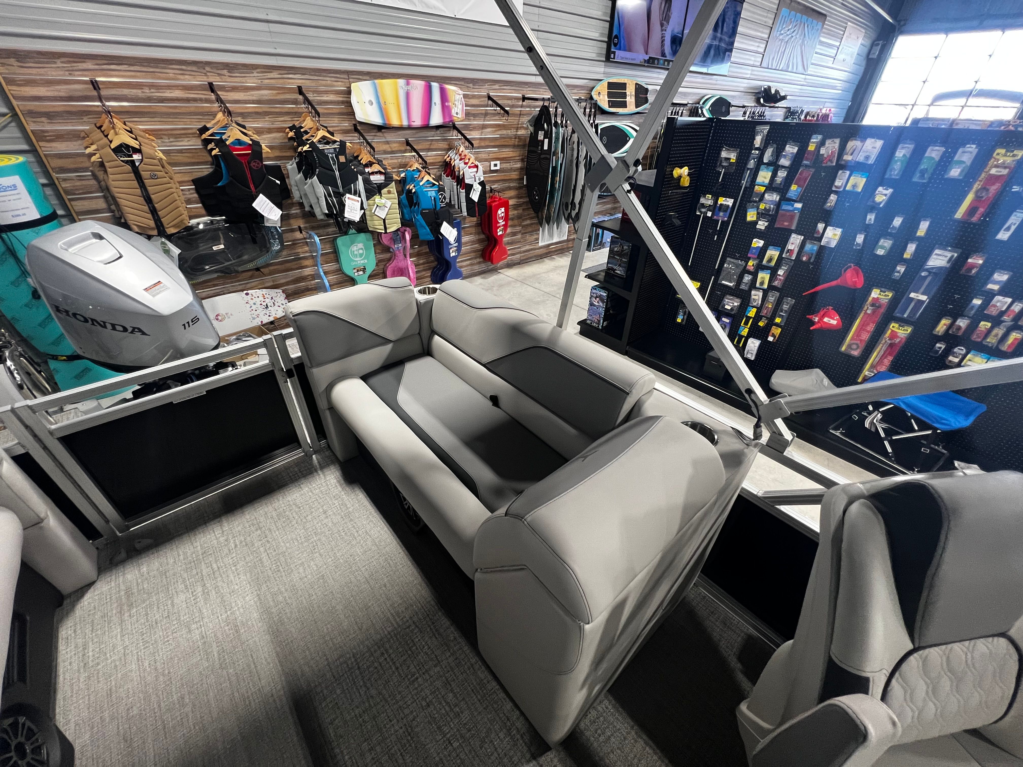 Interior of 2026 Tahoe 2180 Sport Quad Lounger with accessories.