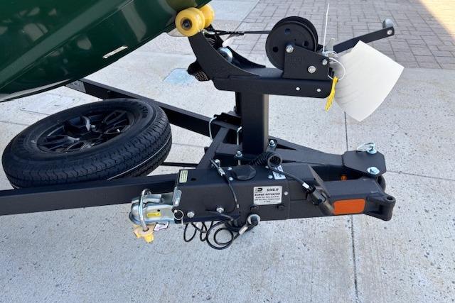 Trailer hitch of 2026 Tracker Bass Tracker Classic Limited boat on pavement.