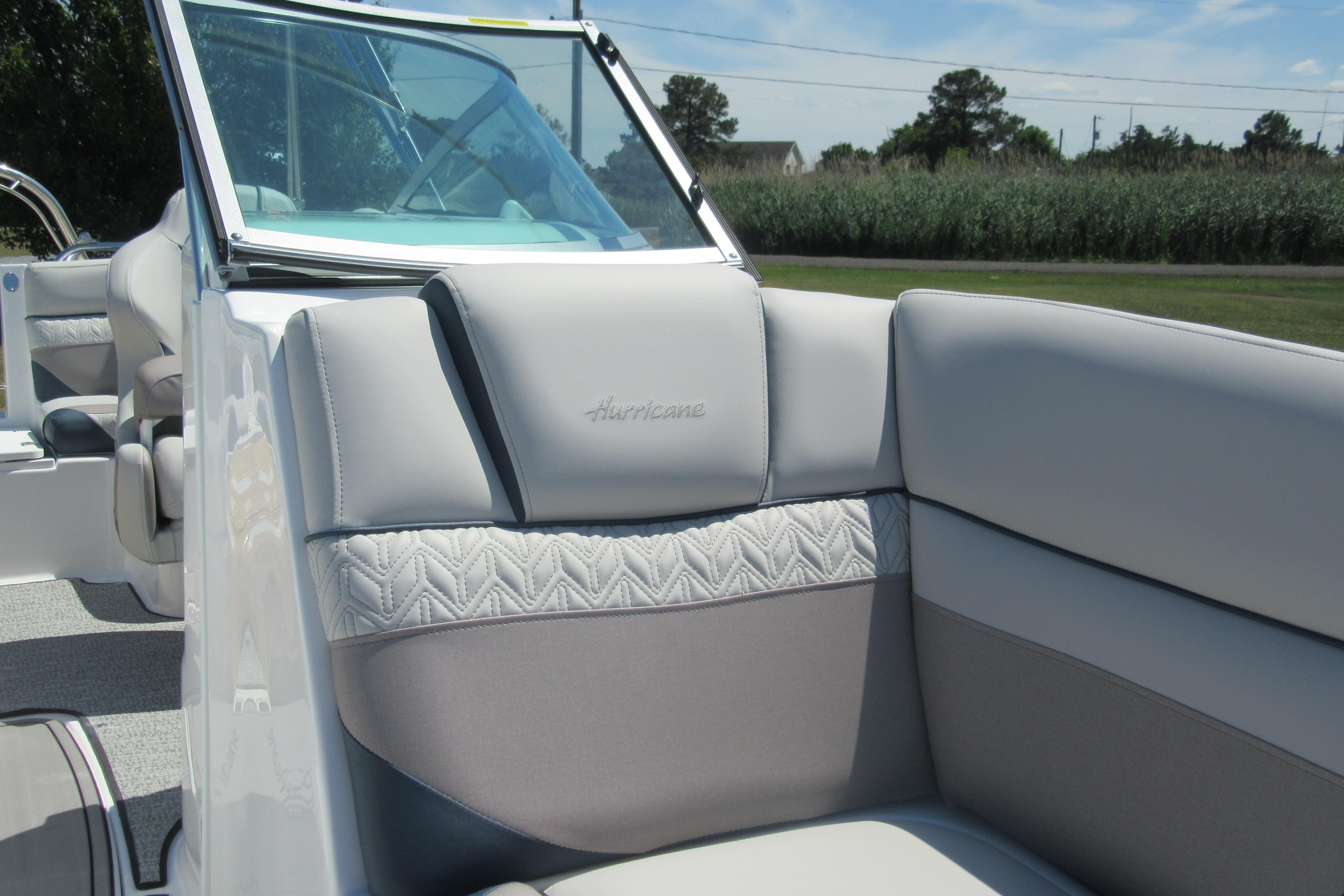 2027 Hurricane SunDeck 2486 OB boat interior with luxurious seating and elegant design.