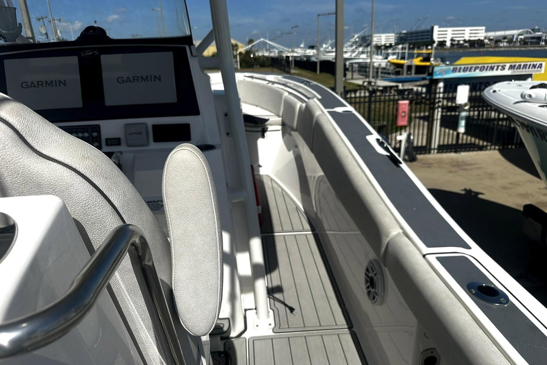 Interior view of a 2002 Sea Fox 228 Commander boat with Garmin displays.