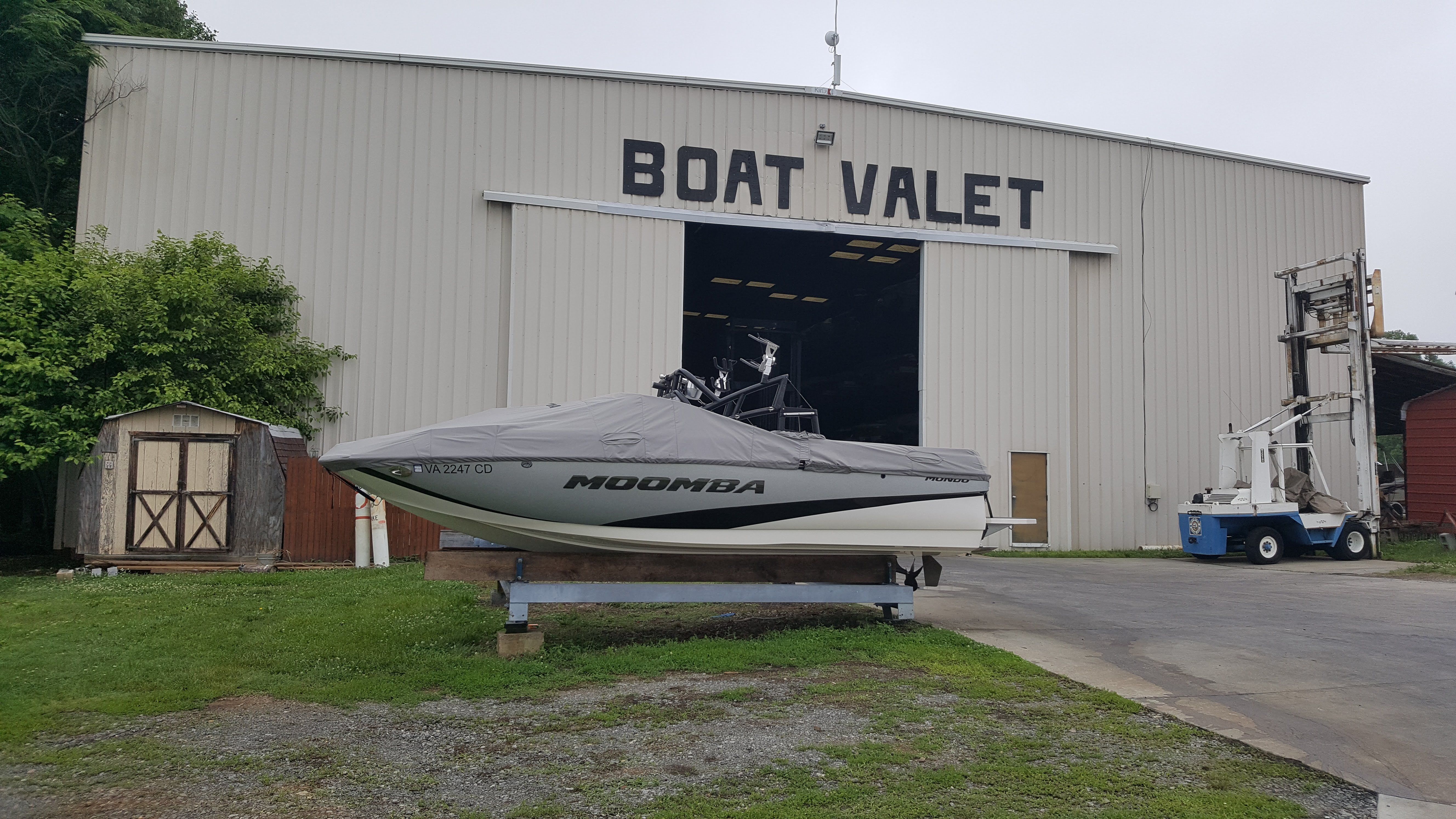 2016 Moomba Mondo in front of a boat storage facility.