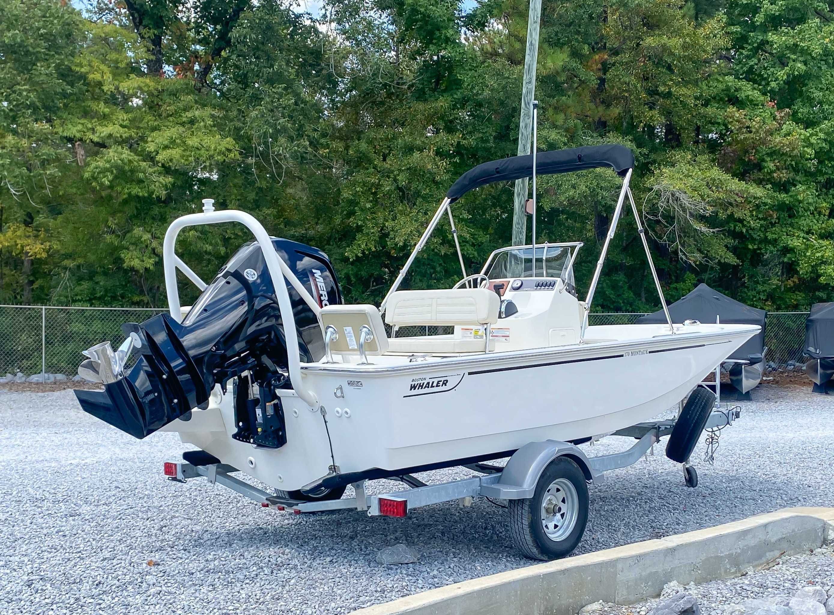2025 Boston Whaler 170 Montauk parked on trailer outdoors.