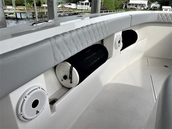 2020 Front Runner 39 Center Console boat interior with speakers and fender storage.