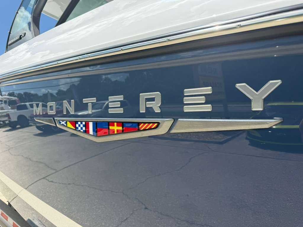 Close-up of the Monterey logo on a boat hull.