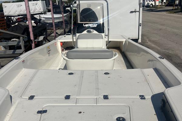 2025 Mako Pro Skiff 15 CC boat interior with seating and console.