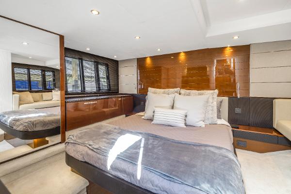 Luxurious bedroom on a 2013 Princess V57 yacht.