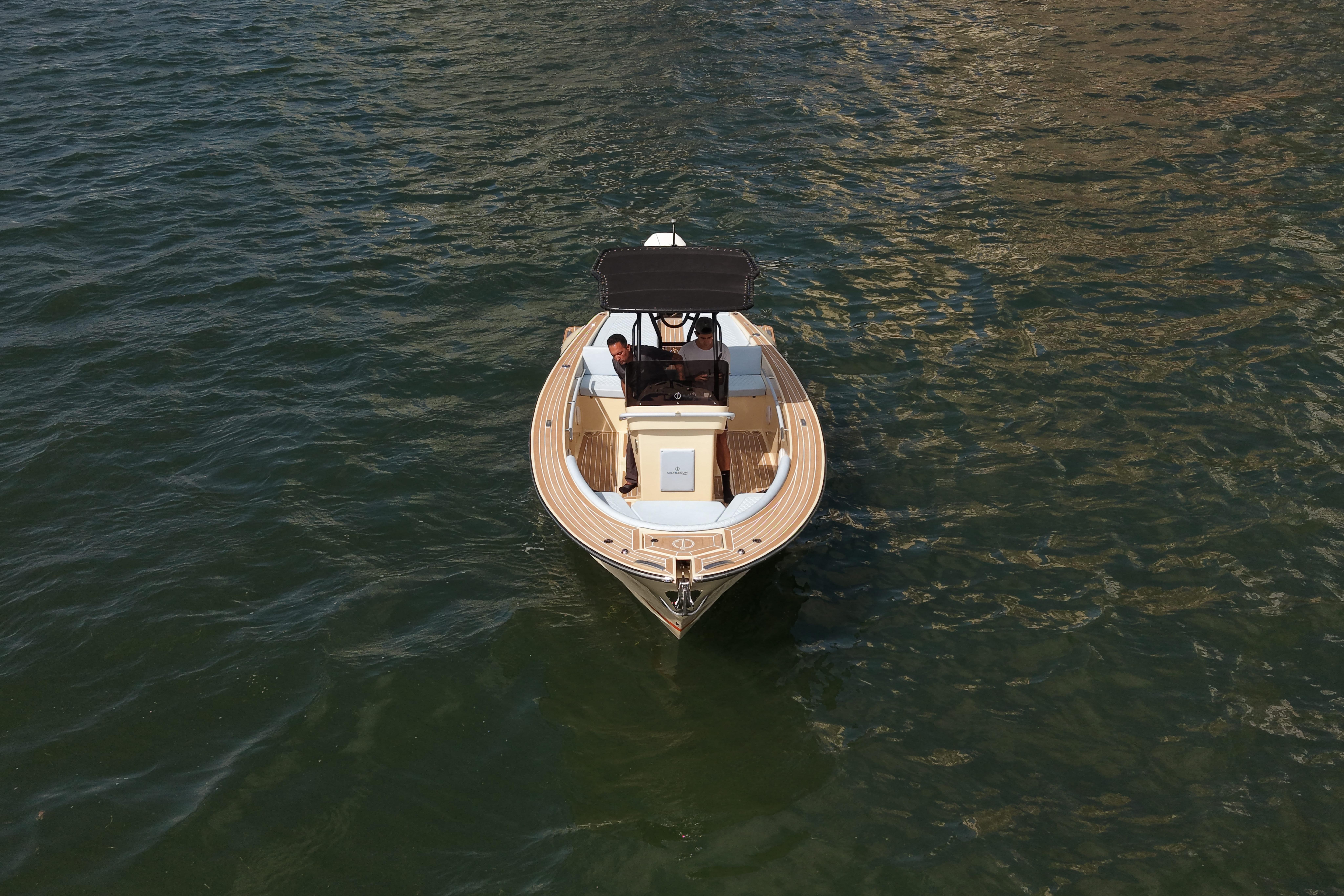 Lilybaeum Levanzo 25 boat cruising on water, 2026 model, aerial view.
