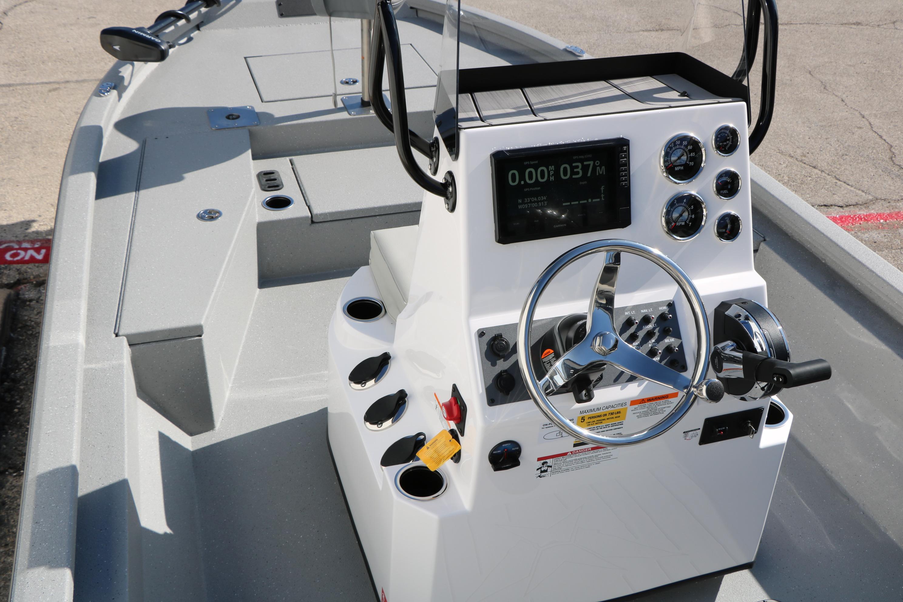 2026 Vexus ACX2000 boat console with steering wheel and control panel.