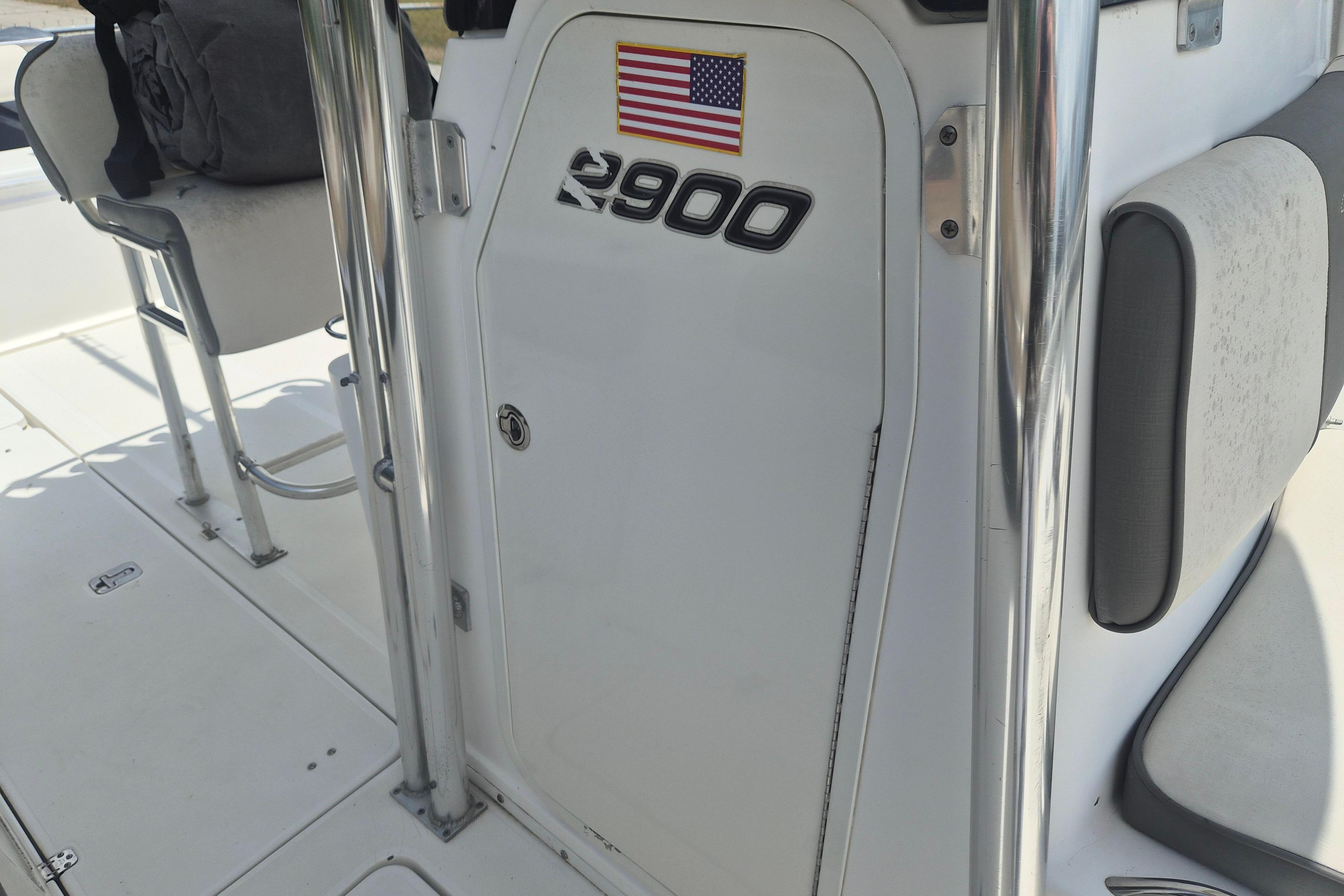 2006 Century 2900 Center Console boat interior with American flag decal.