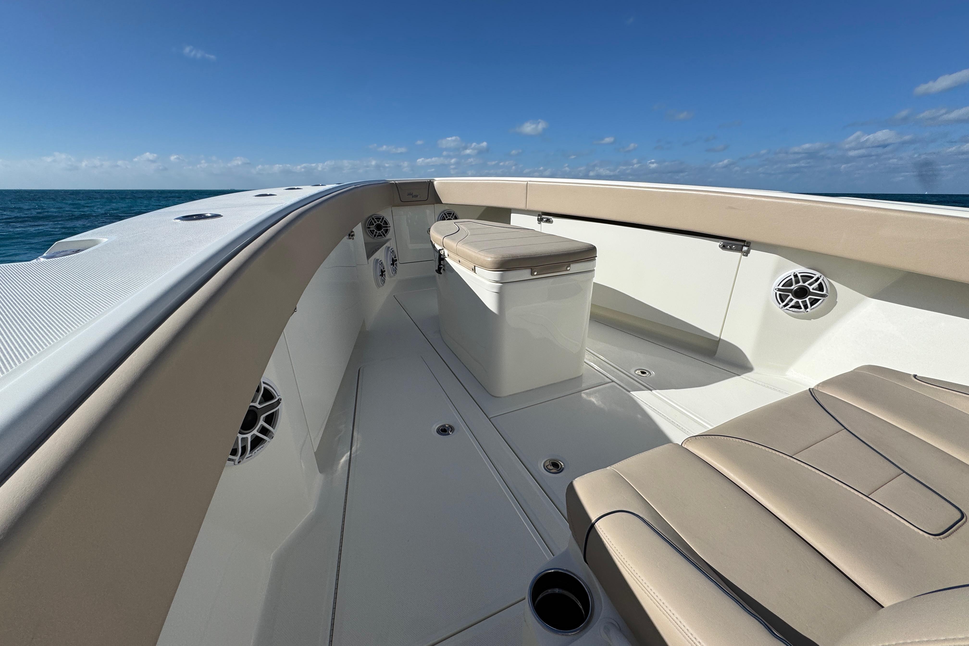 2021 SeaVee Boats 370Z deck view with seating and ocean backdrop.