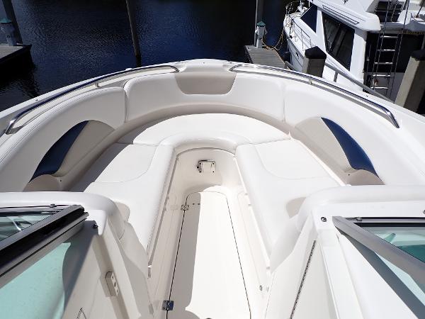 2011 Chaparral 287 SSX boat with spacious white seating area.