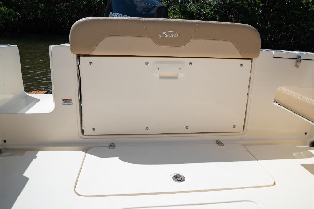 2023 Scout 240 Dorado boat interior with seating and storage compartment.