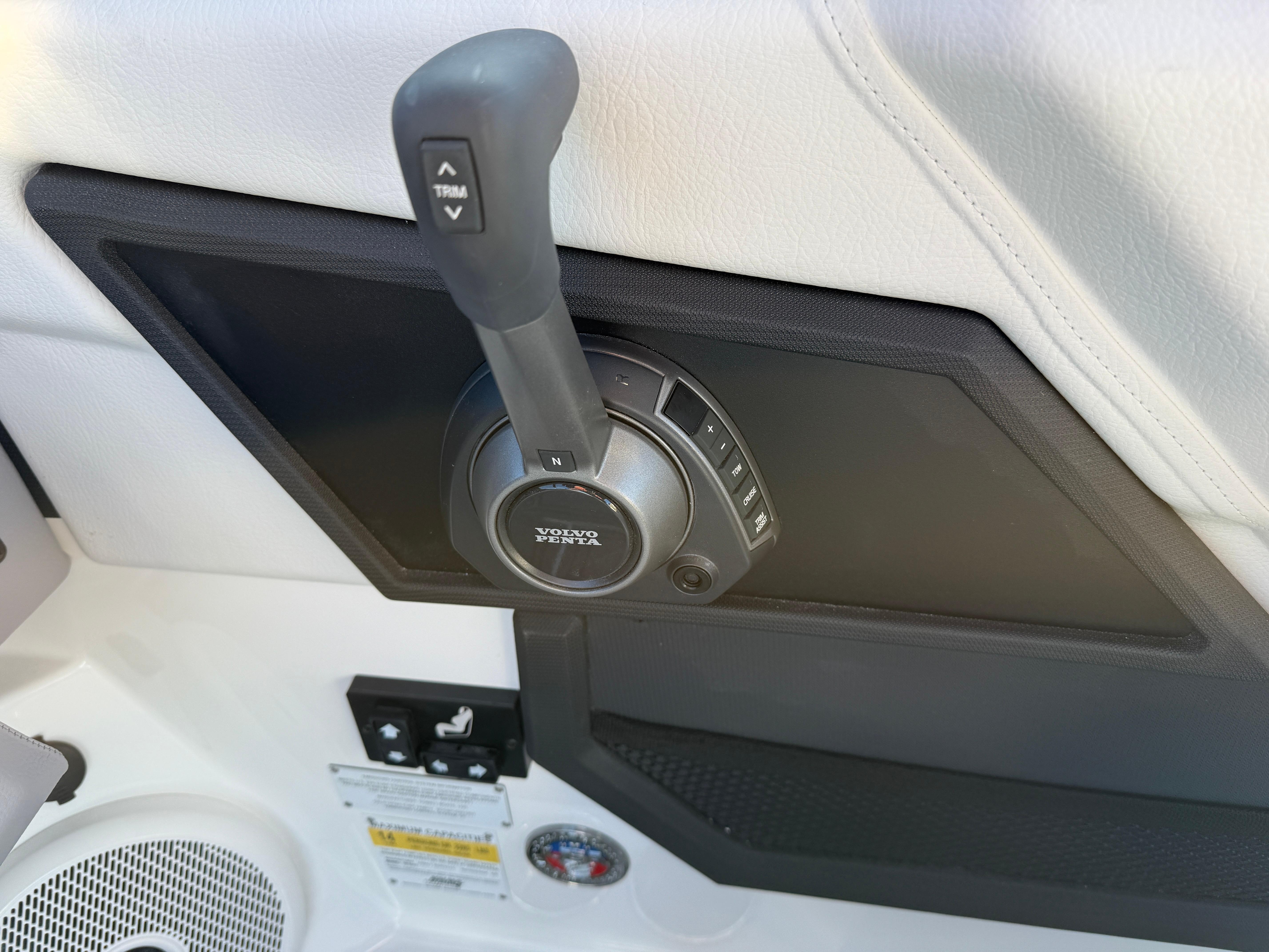 Throttle control panel of 2025 Cobalt R6 Surf boat, featuring trim adjustment.