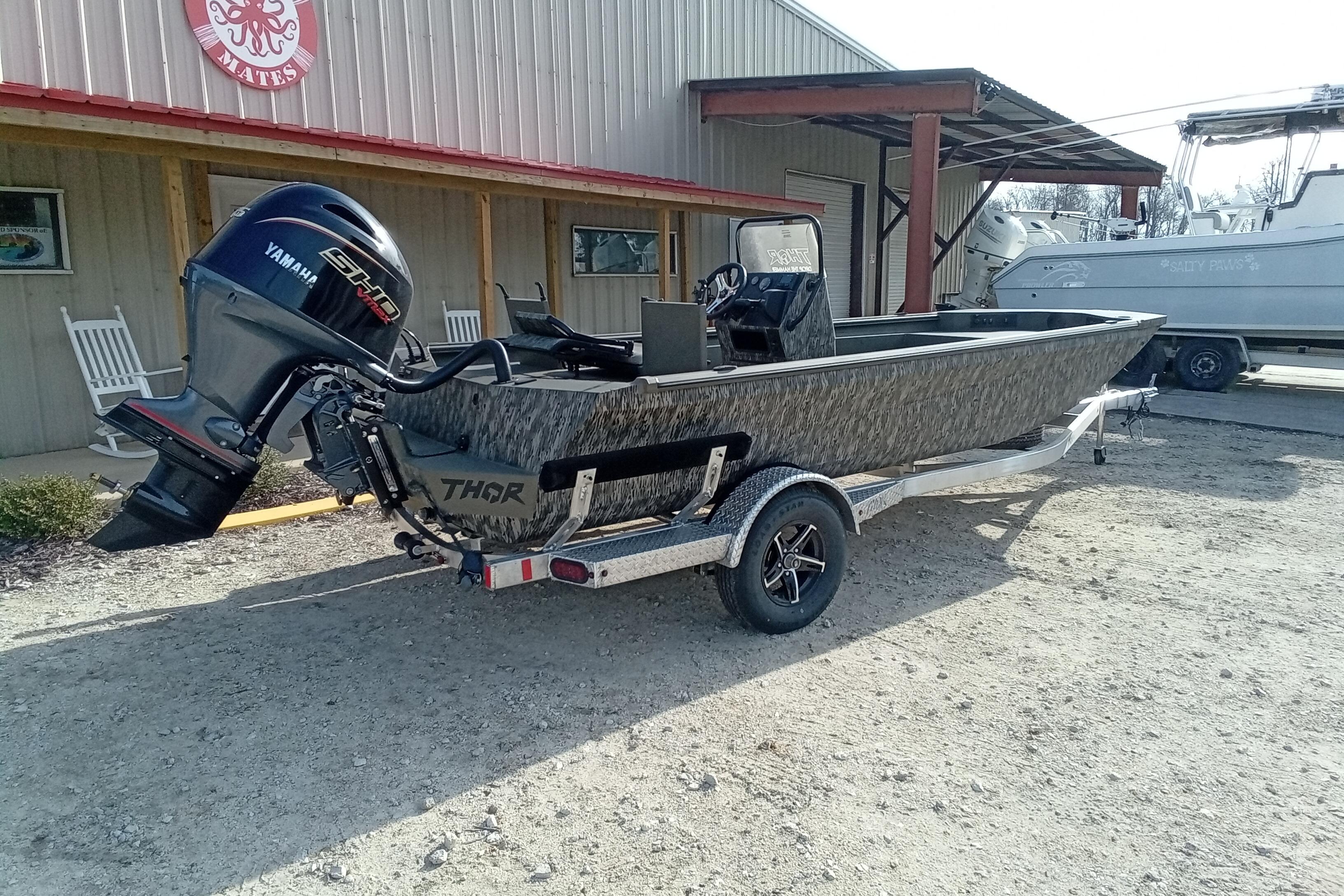2026 Thor 1900 Low Country Elite boat with Yamaha engine on trailer.