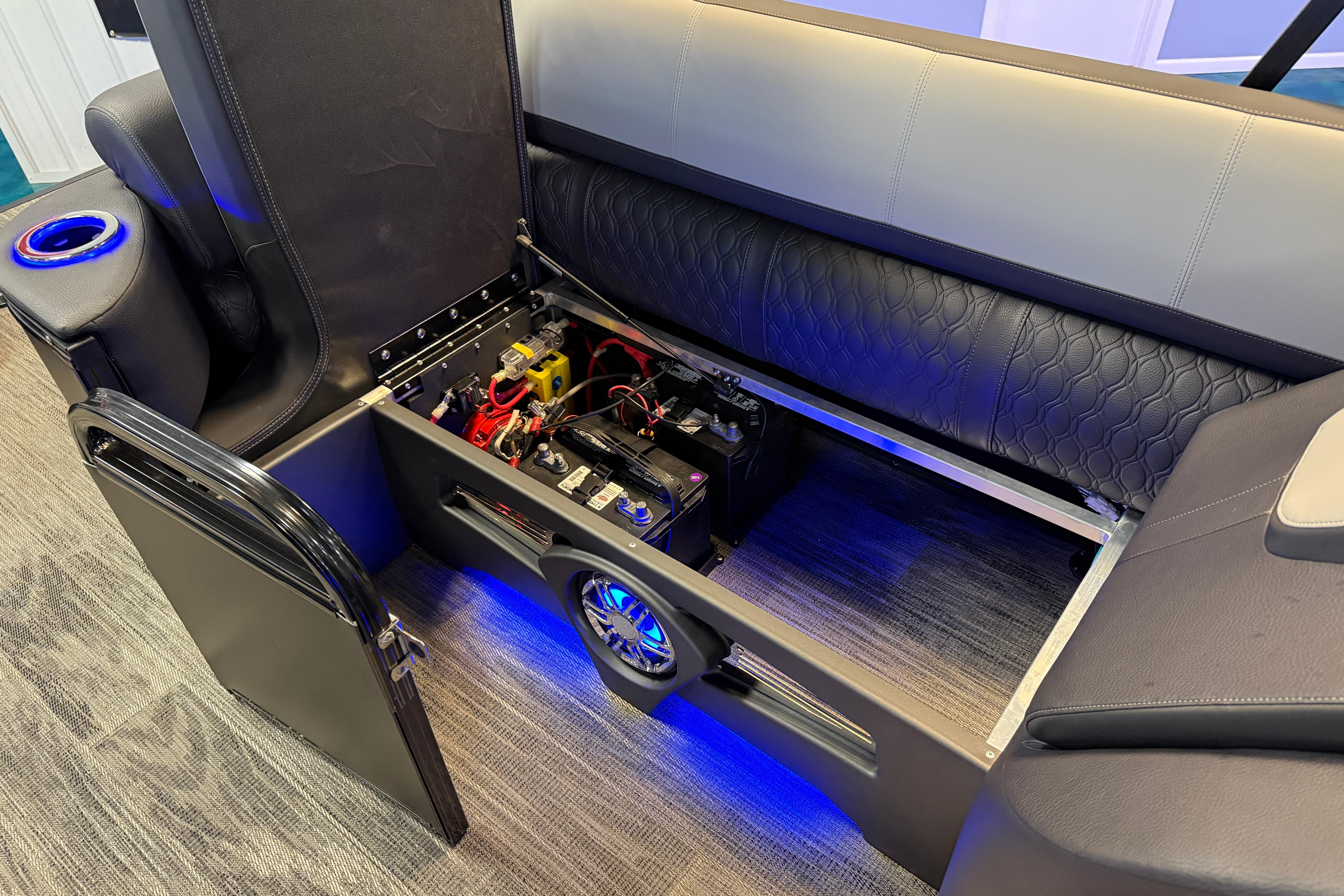 2026 Tahoe Pontoon Cascade Cruise Rear Bench with open storage and illuminated interior.